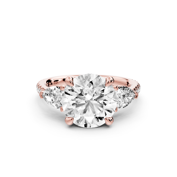 Alma - 3ct 14k rose gold round center stone with two pear shaped diamonds and Pavé. Three stone oval and pear engagment ring with Pavé