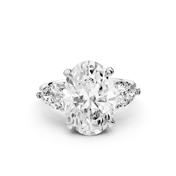 Alma - 4ct 14k white gold oval center stone with two pear shaped diamonds and pavé. Three stone oval and pear Engagement ring with Pavé