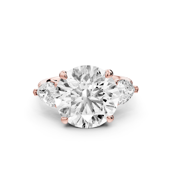 Alma - 5ct 14k rose gold round center stone with two pear shaped diamonds and Pavé. Three stone oval and pear engagment ring with Pavé