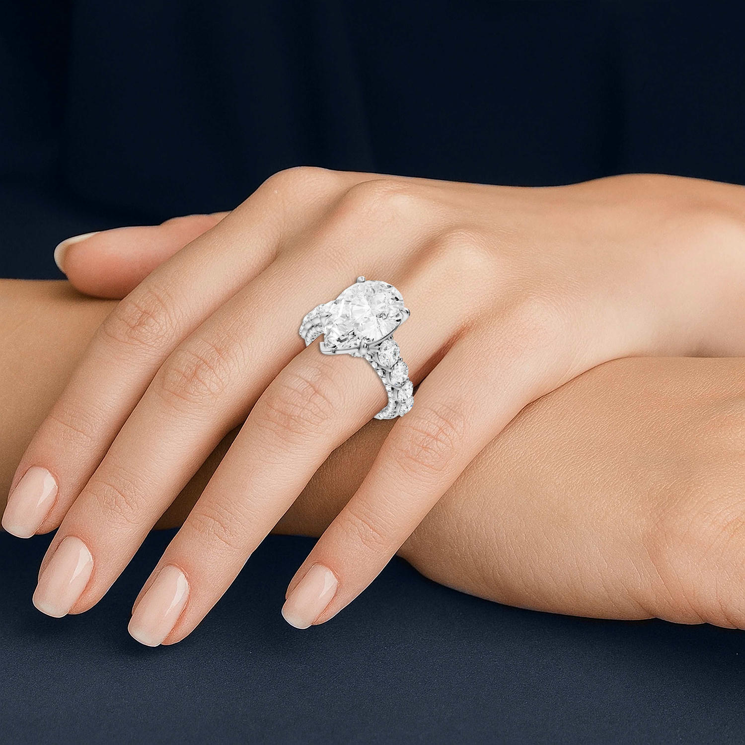 Rocio - 5ct platinum Pear Hidden Halo Engagement Ring with Graduated Side Stones and Double Pavé Band