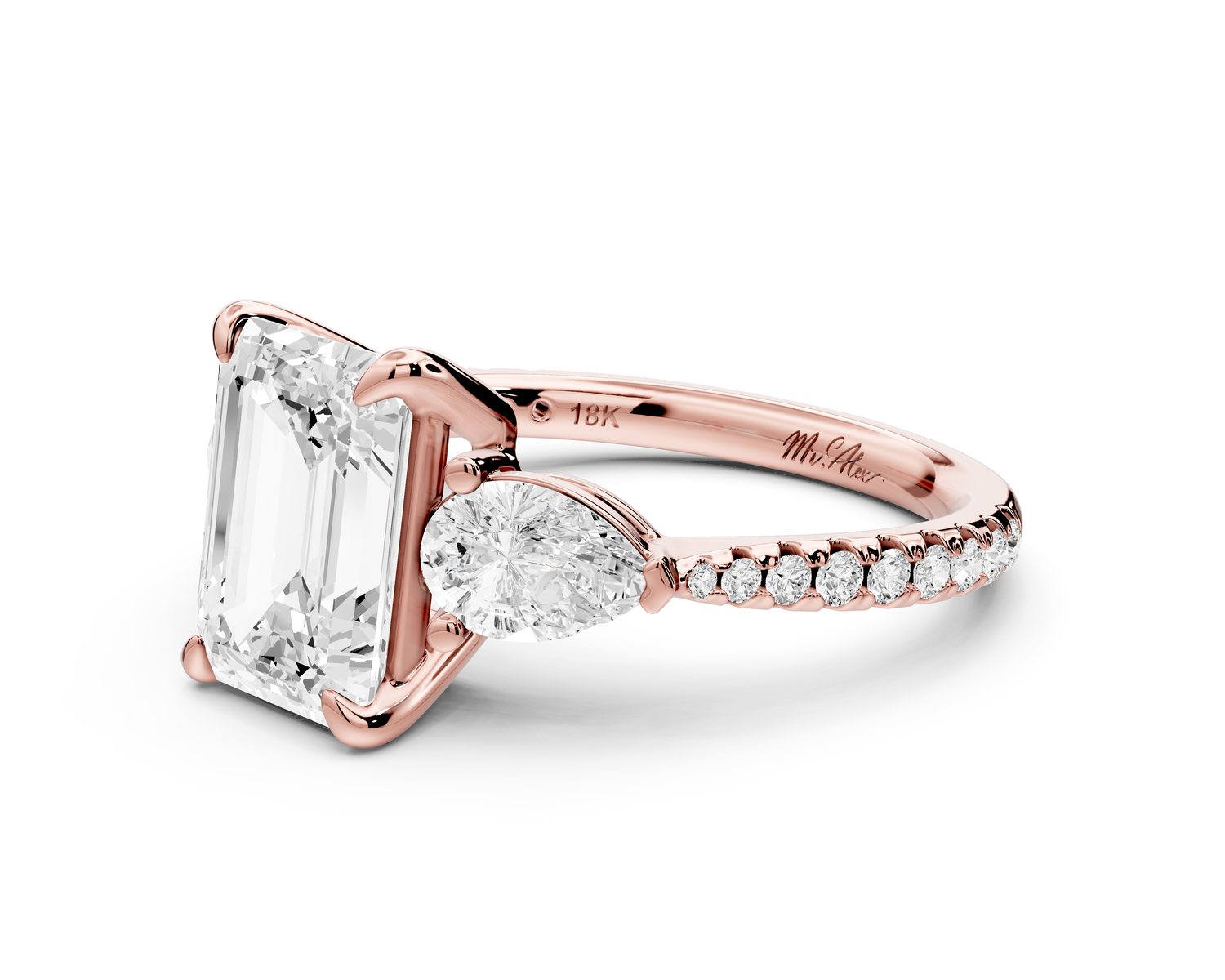 Alma - 2ct 14k rose gold emerald center stone with two pear shaped diamonds and pavé. Three stone oval and pear Engagement ring with Pavé