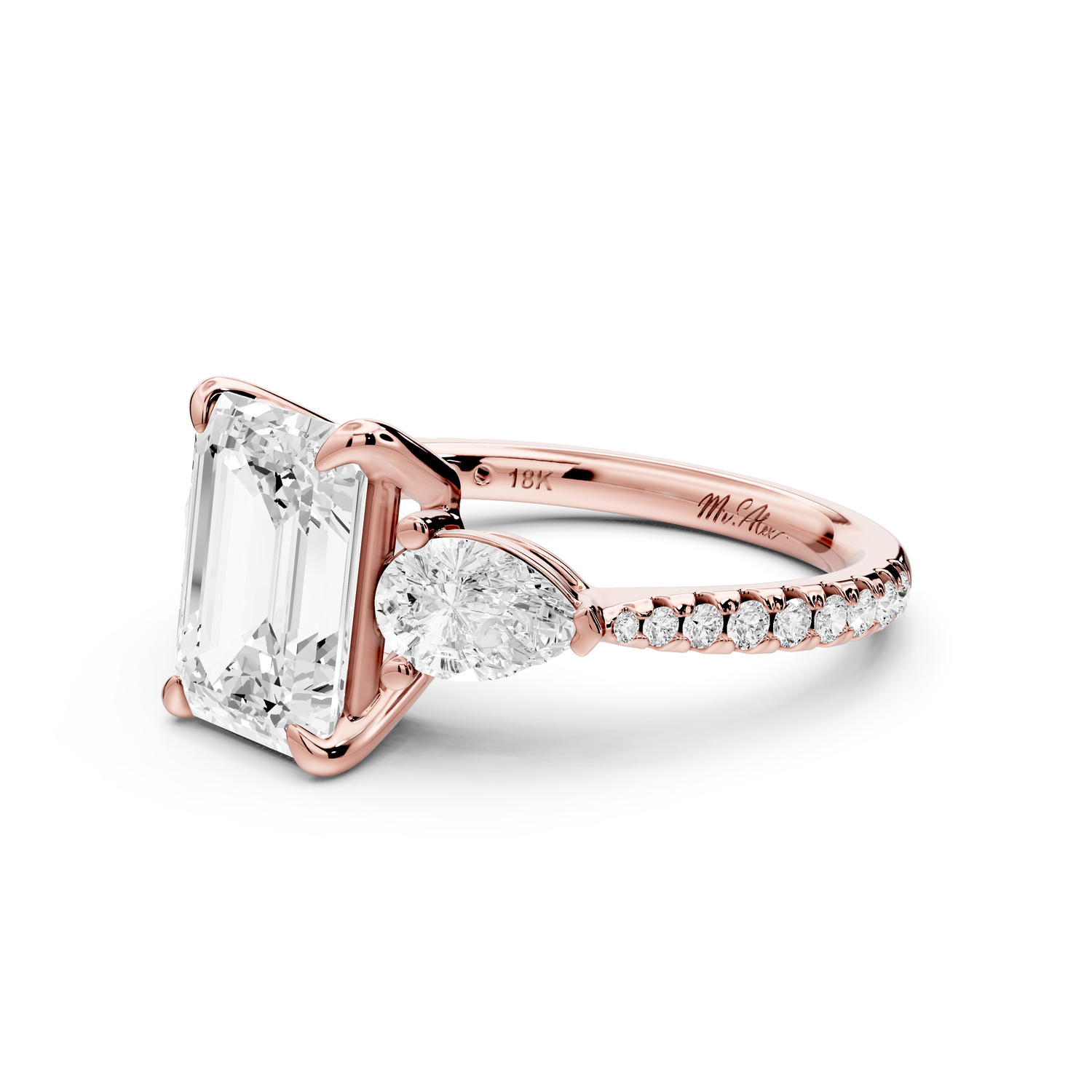 Alma - 2ct 14k rose gold emerald center stone with two pear shaped diamonds and pavé. Three stone oval and pear Engagement ring with Pavé