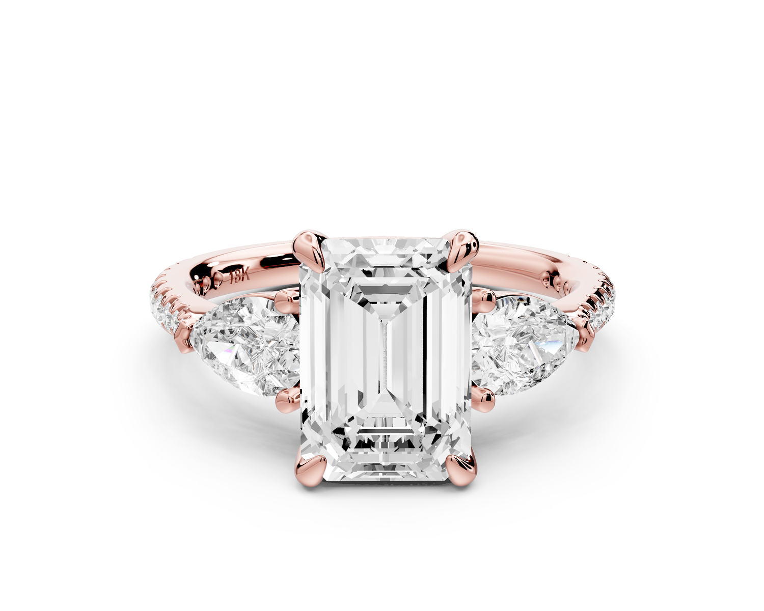 Alma - 2ct 14k rose gold emerald center stone with two pear shaped diamonds and pavé. Three stone oval and pear Engagement ring with Pavé