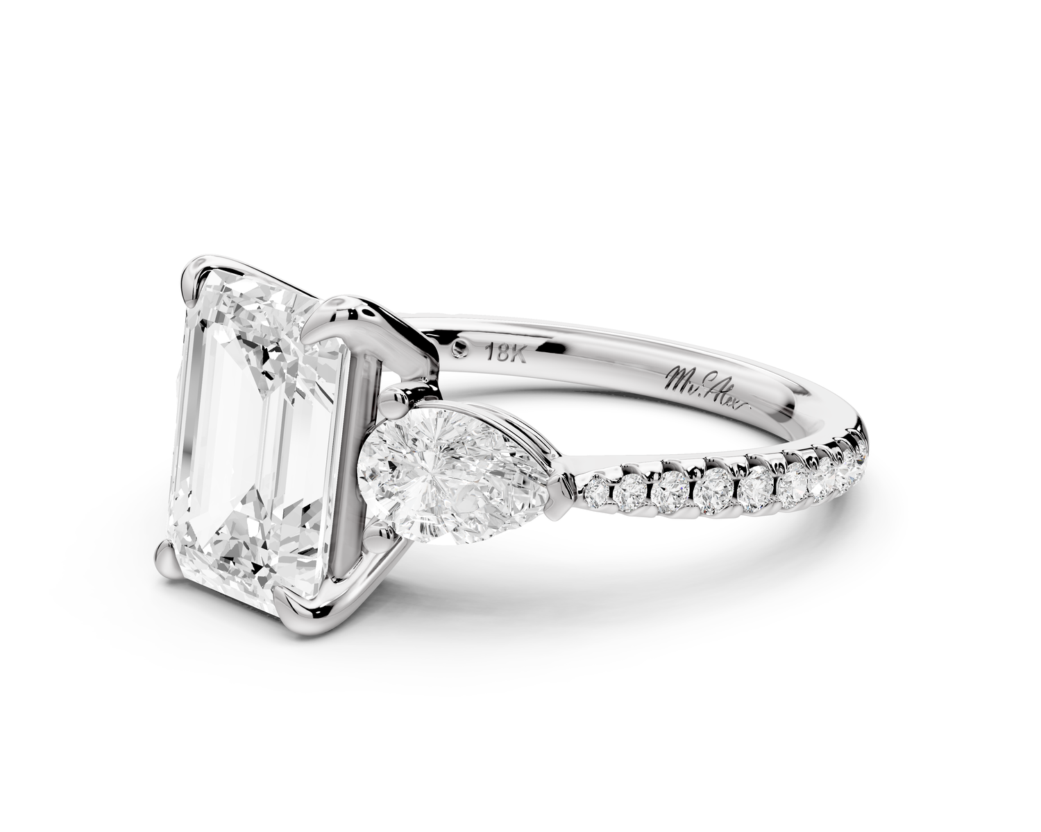 Alma - 2ct 14k white gold emerald center stone with two pear shaped diamonds and pavé. Three stone oval and pear Engagement ring with Pavé