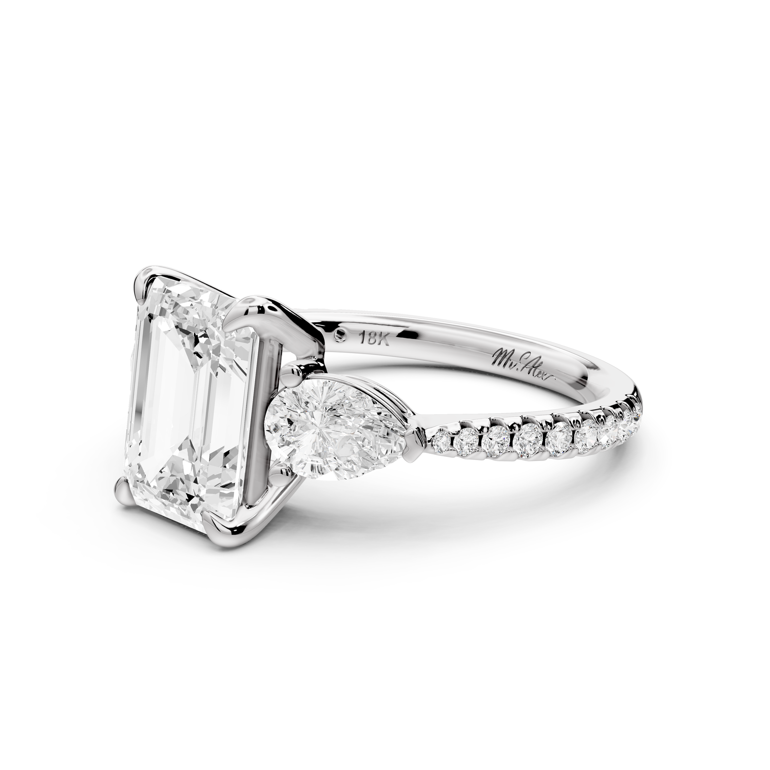 Alma - 2ct 14k white gold emerald center stone with two pear shaped diamonds and pavé. Three stone oval and pear Engagement ring with Pavé
