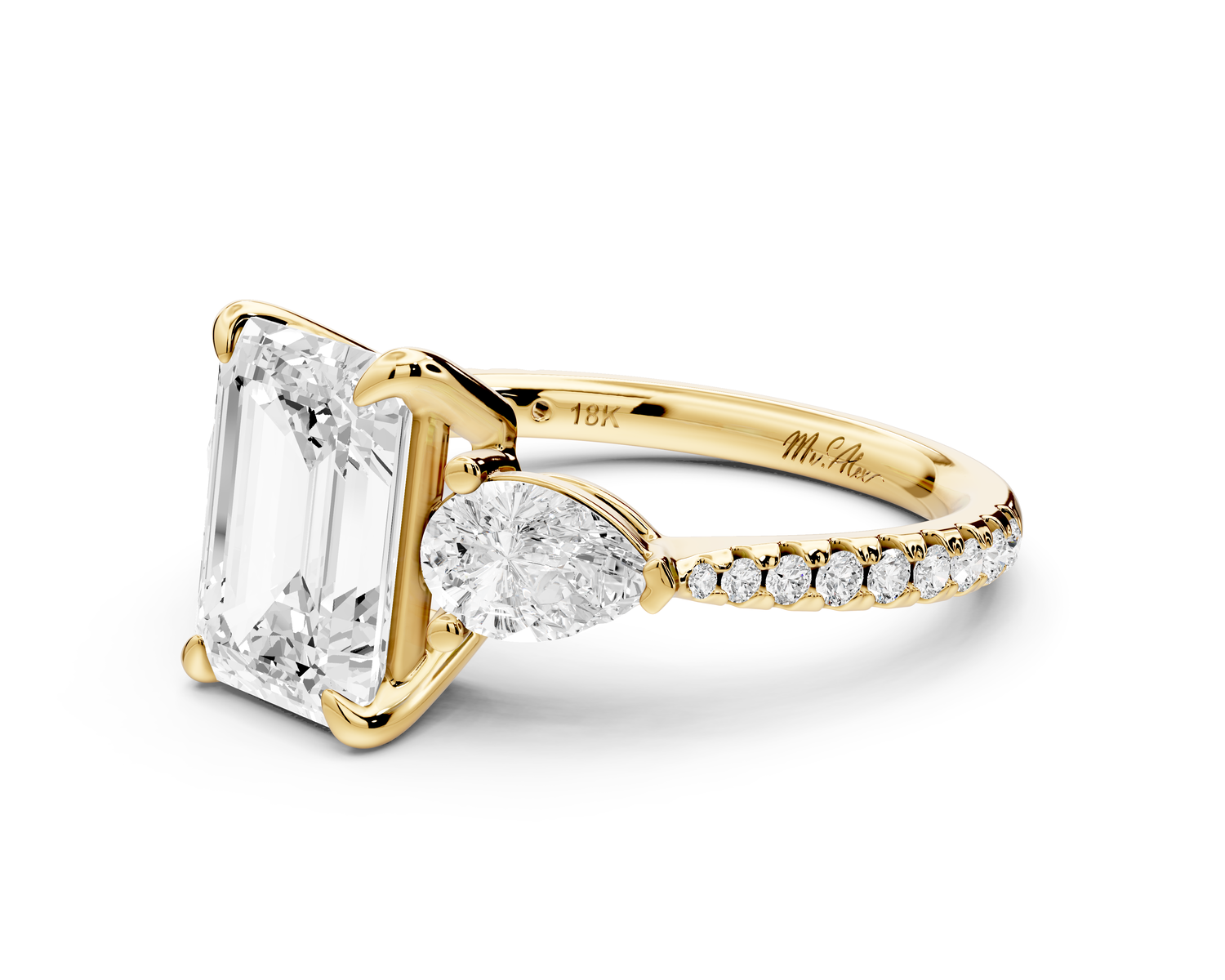 Alma - 2ct 14k yellow gold emerald center stone with two pear shaped diamonds and pavé. Three stone oval and pear Engagement ring with Pavé