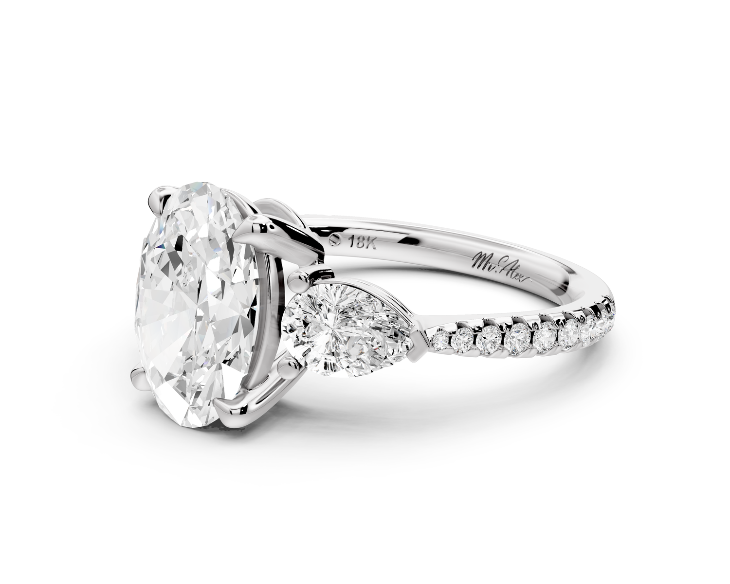 Alma - 2ct 14k white gold oval center stone with two pear shaped diamonds and pavé. Three stone oval and pear Engagement ring with Pavé
