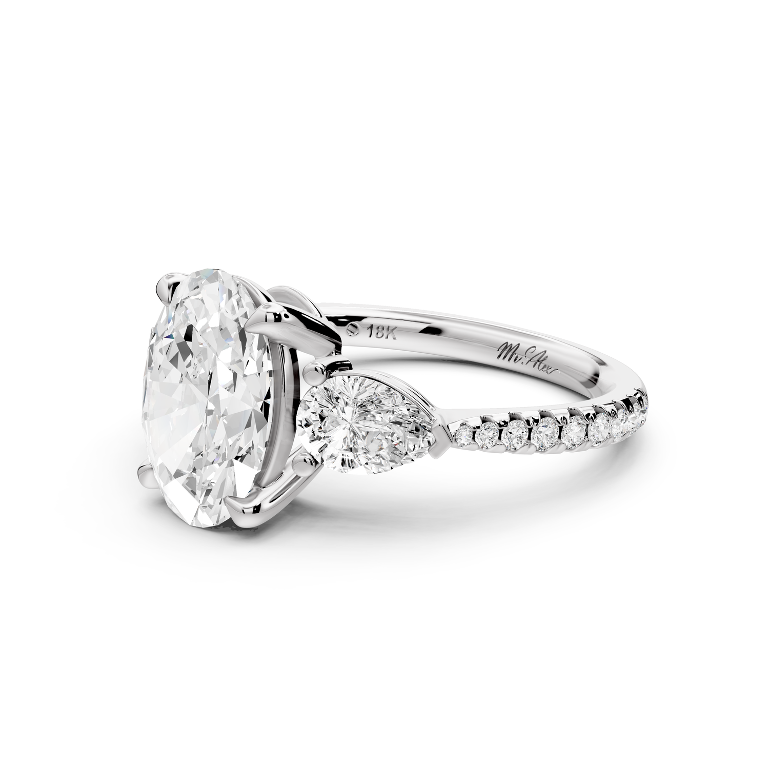 Alma - 2ct 14k white gold oval center stone with two pear shaped diamonds and pavé. Three stone oval and pear Engagement ring with Pavé