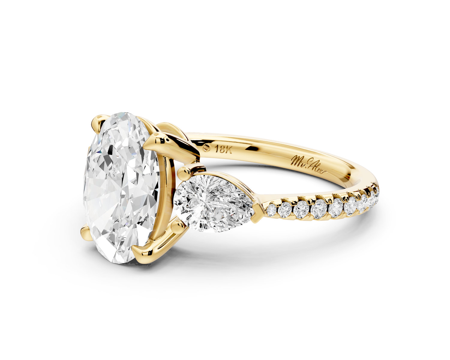 Alma - 2ct 14k yellow gold oval center stone with two pear shaped diamonds and pavé. Three stone oval and pear Engagement ring with Pavé