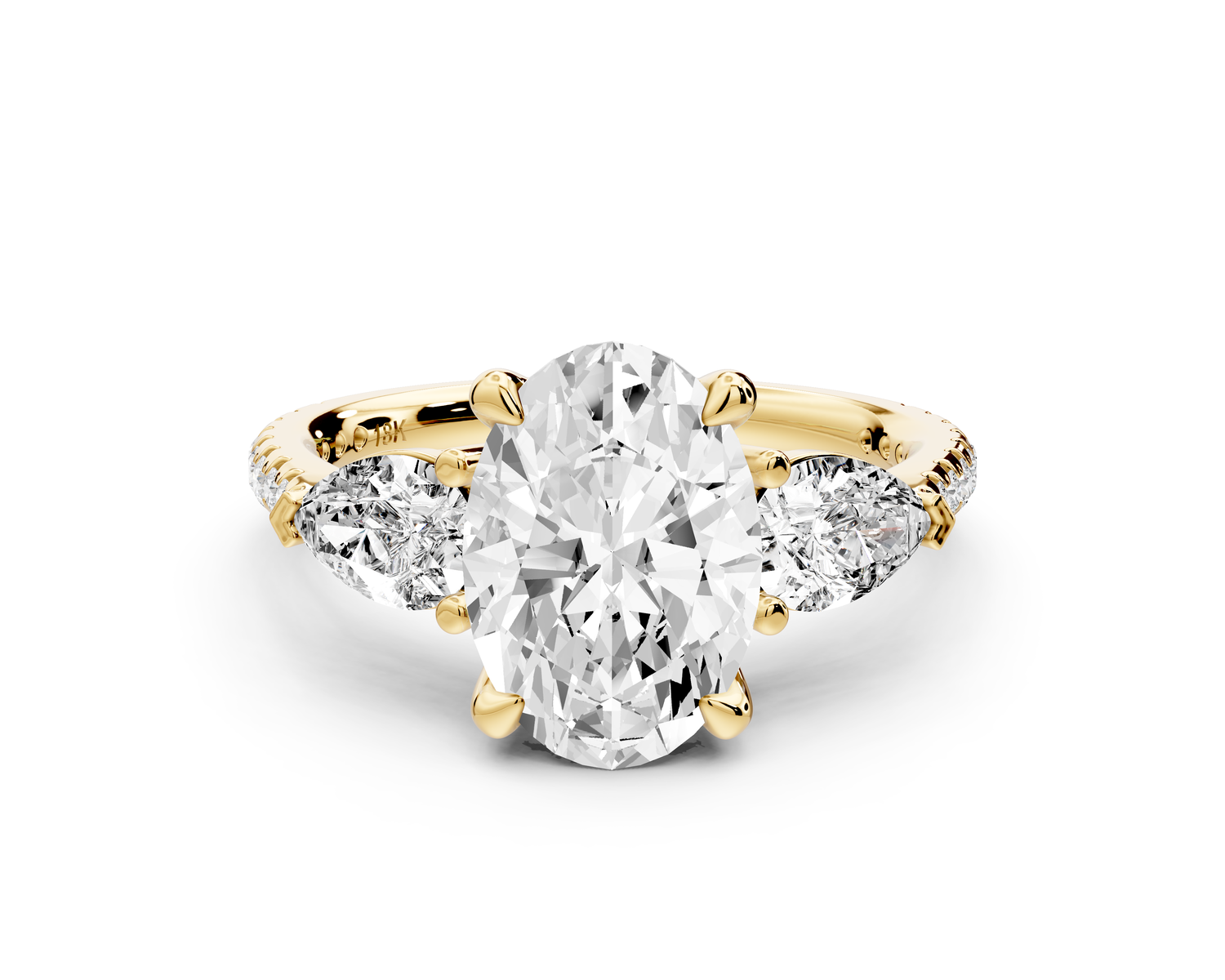 Alma - 2ct 14k yellow gold oval center stone with two pear shaped diamonds and pavé. Three stone oval and pear Engagement ring with Pavé