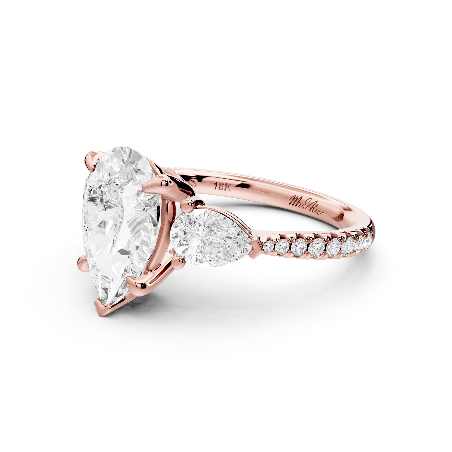 Alma - 2ct 14k rose gold pear center stone with two pear shaped diamonds and pavé. Three stone oval and pear Engagement ring with Pavé