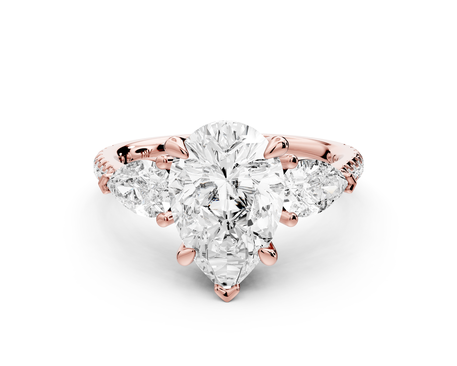 Alma - 2ct 14k rose gold pear center stone with two pear shaped diamonds and pavé. Three stone oval and pear Engagement ring with Pavé