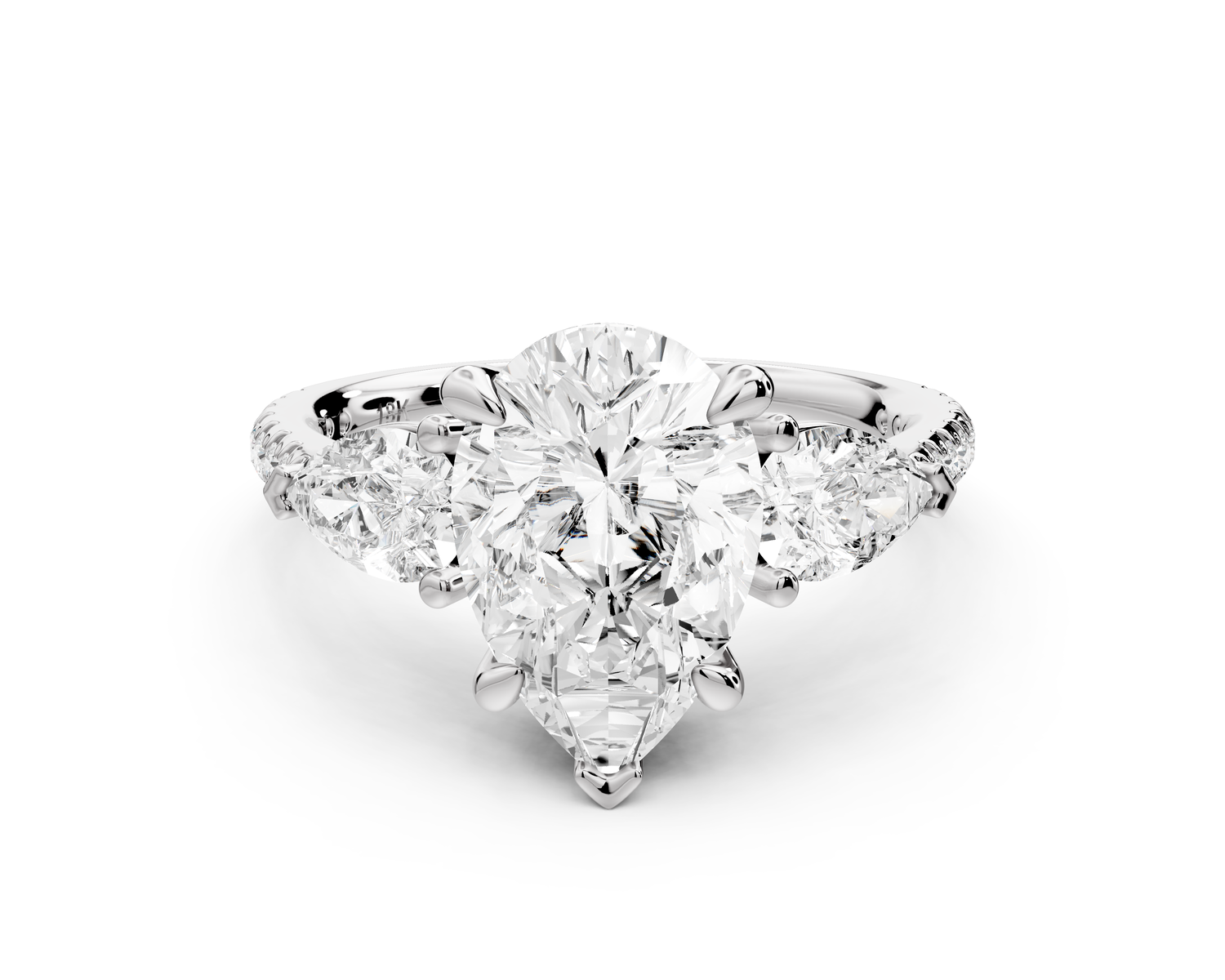 Alma - 2ct 14k white gold pear center stone with two pear shaped diamonds and pavé. Three stone oval and pear Engagement ring with Pavé