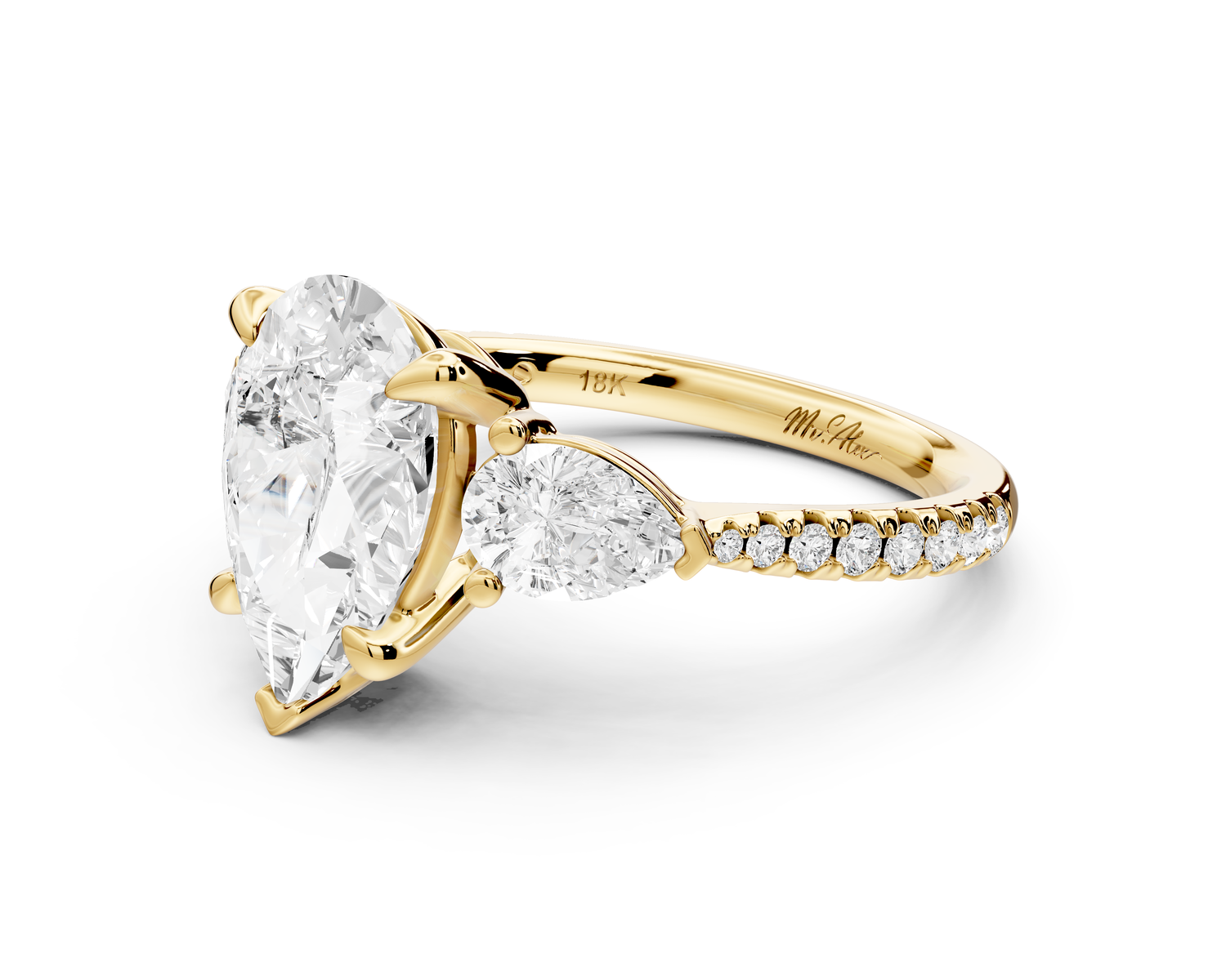 Alma - 2ct 14k yellow gold pear center stone with two pear shaped diamonds and pavé. Three stone oval and pear Engagement ring with Pavé