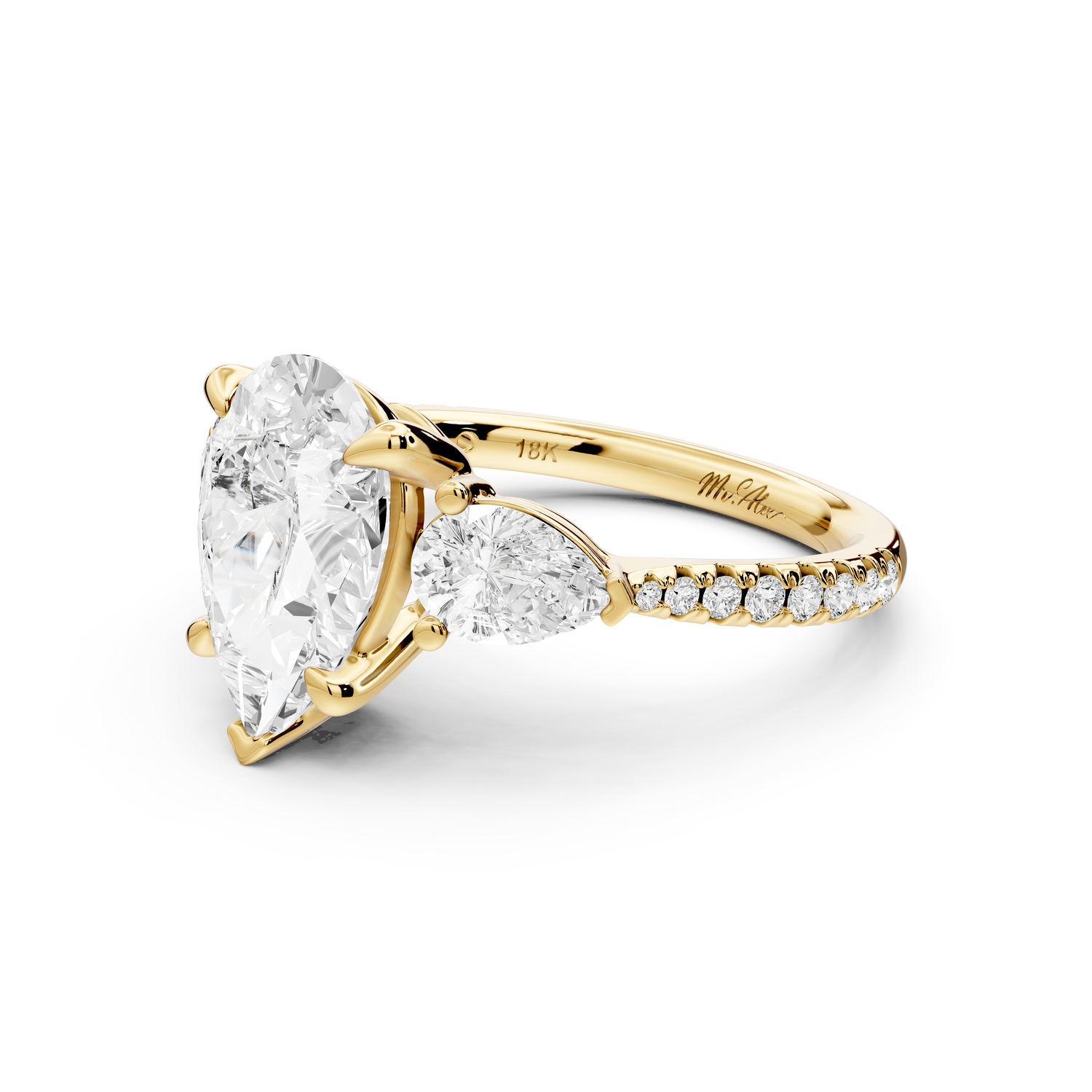 Alma - 2ct 14k yellow gold pear center stone with two pear shaped diamonds and pavé. Three stone oval and pear Engagement ring with Pavé