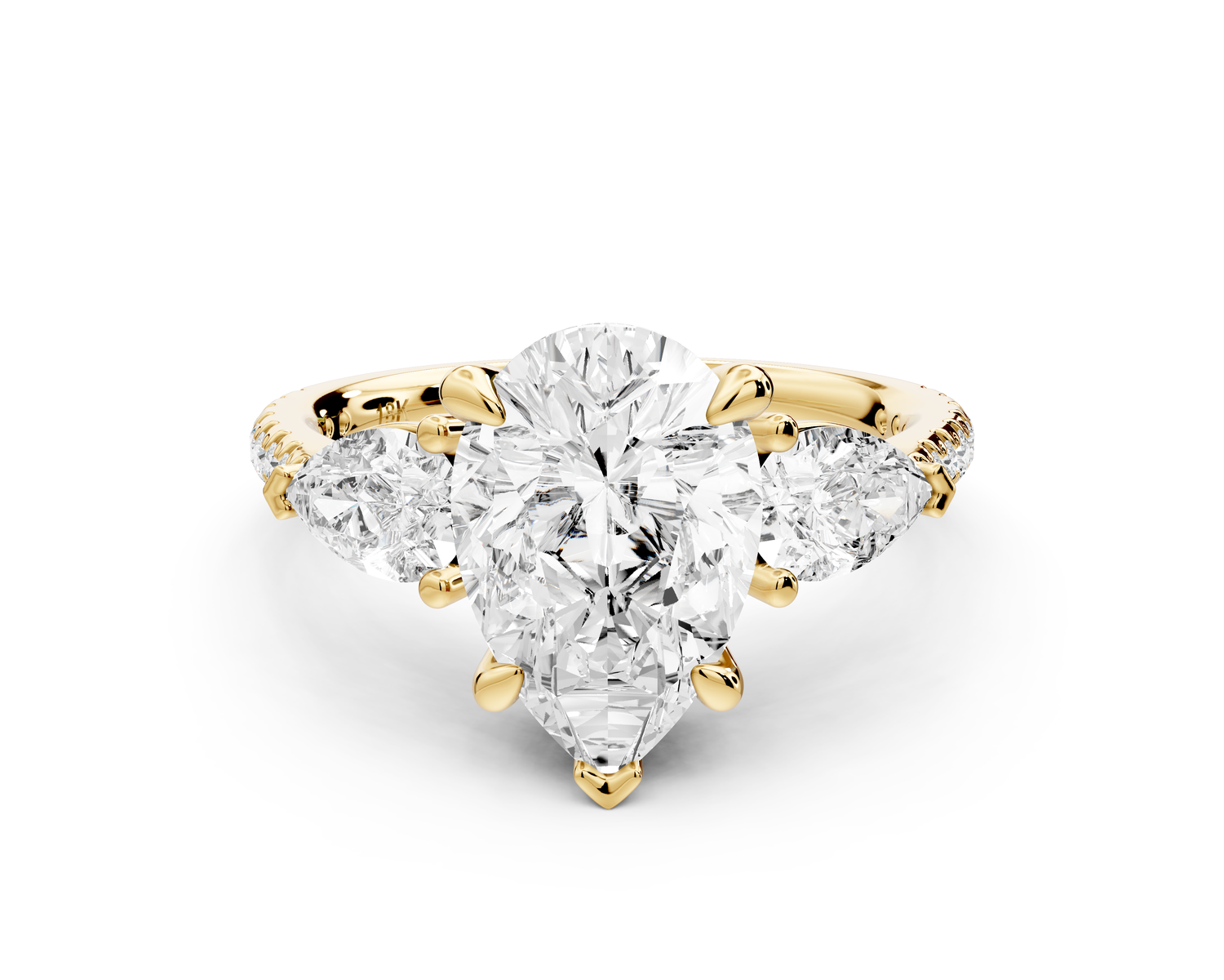 Alma - 2ct 14k yellow gold pear center stone with two pear shaped diamonds and pavé. Three stone oval and pear Engagement ring with Pavé