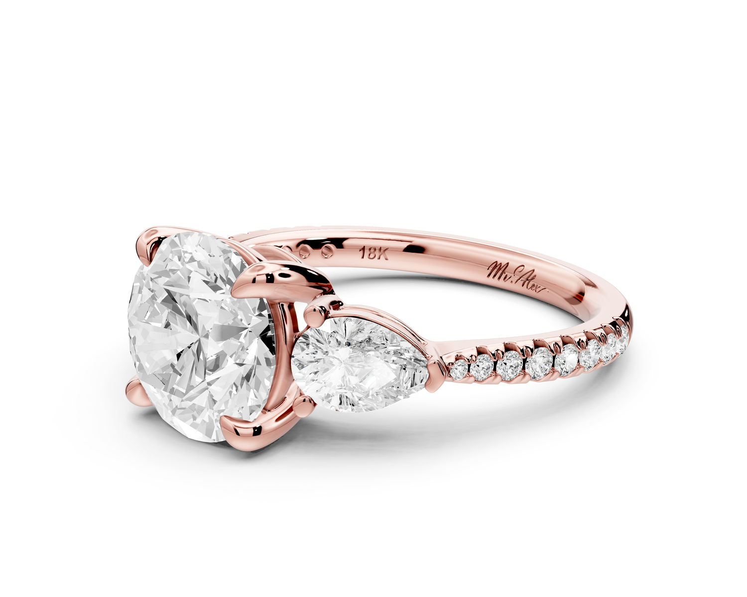 Alma - 2ct 14k rose gold round center stone with two pear shaped diamonds and pavé. Three stone oval and pear engagment ring with Pavé