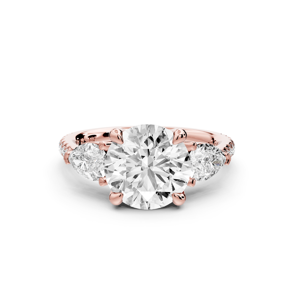 Alma - 2ct 18k rose gold round center stone with two pear shaped diamonds and Pavé. Three stone oval and pear engagment ring with Pavé