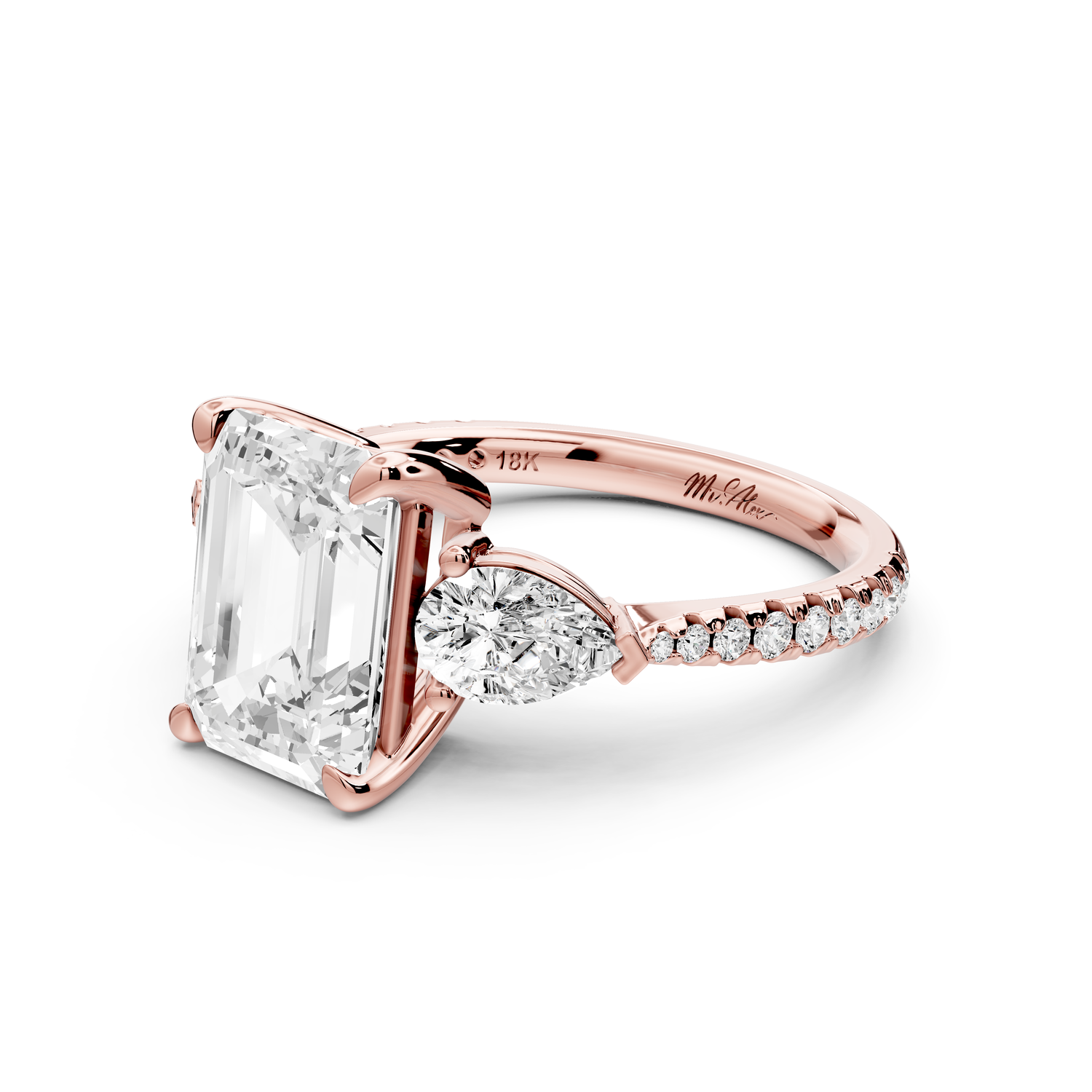 Alma - 3ct 14k rose gold emerald center stone with two pear shaped diamonds and pavé. Three stone oval and pear Engagement ring with Pavé