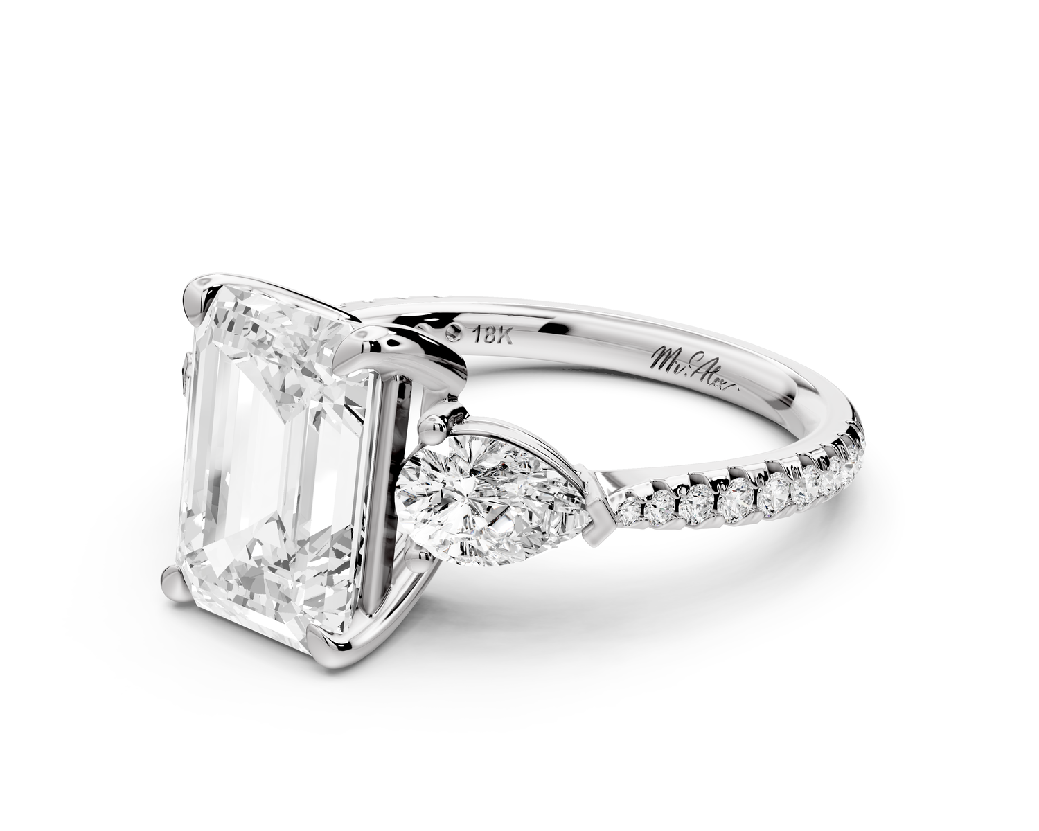 Alma - 3ct 14k white gold emerald center stone with two pear shaped diamonds and pavé. Three stone oval and pear Engagement ring with Pavé