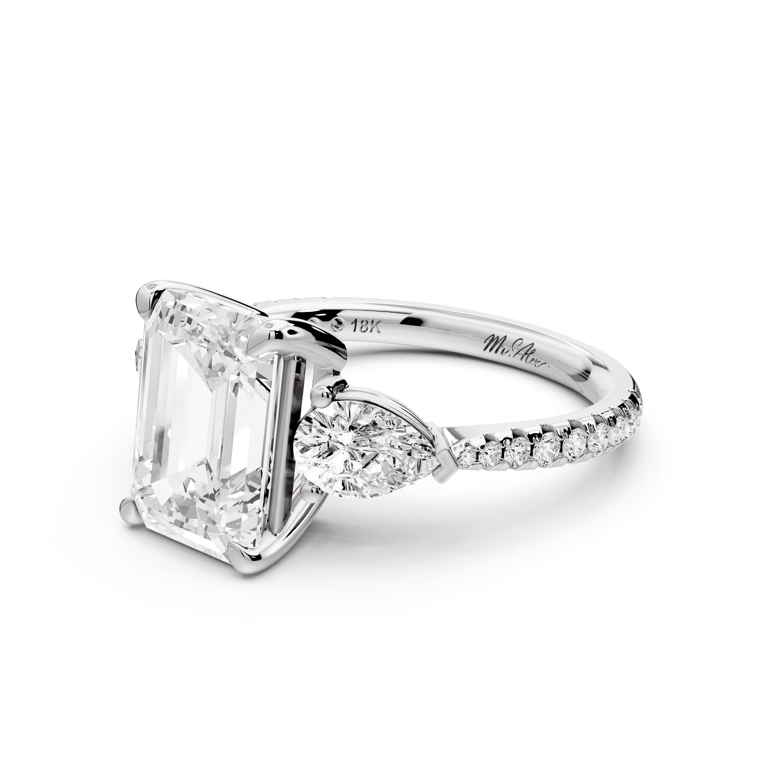 Alma - 3ct 14k white gold emerald center stone with two pear shaped diamonds and pavé. Three stone oval and pear Engagement ring with Pavé