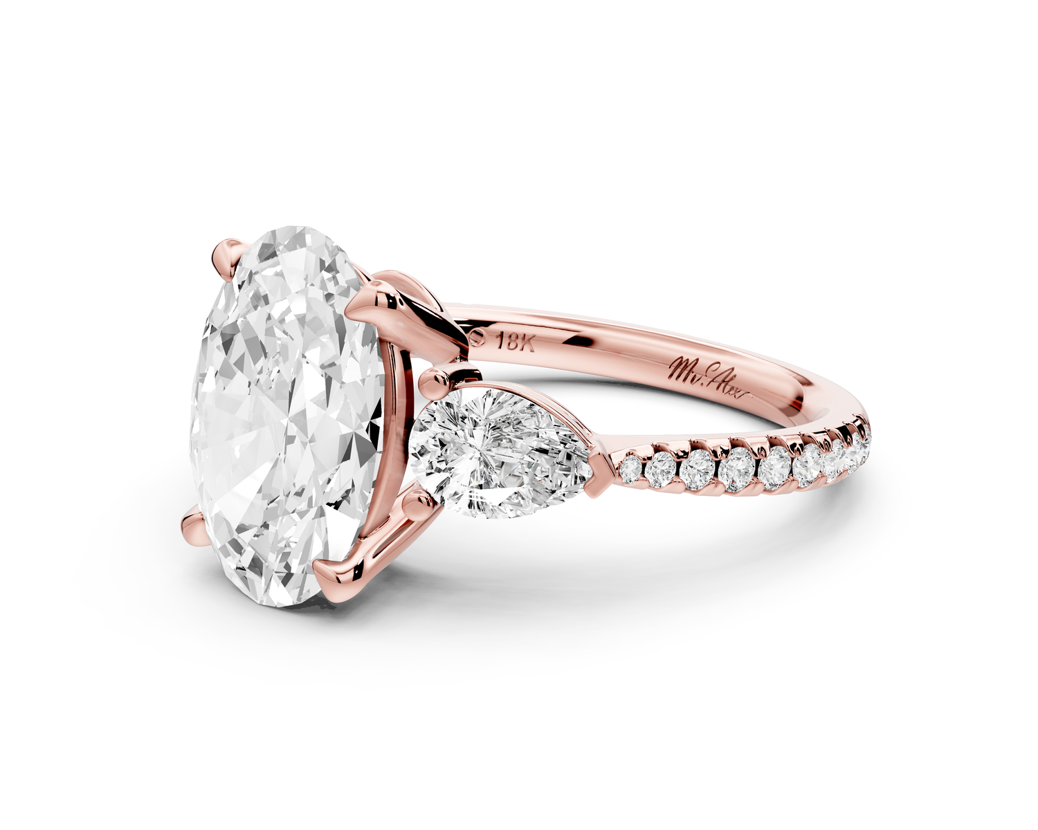 Alma - 3ct 14k rose gold oval center stone with two pear shaped diamonds and pavé. Three stone oval and pear Engagement ring with Pavé