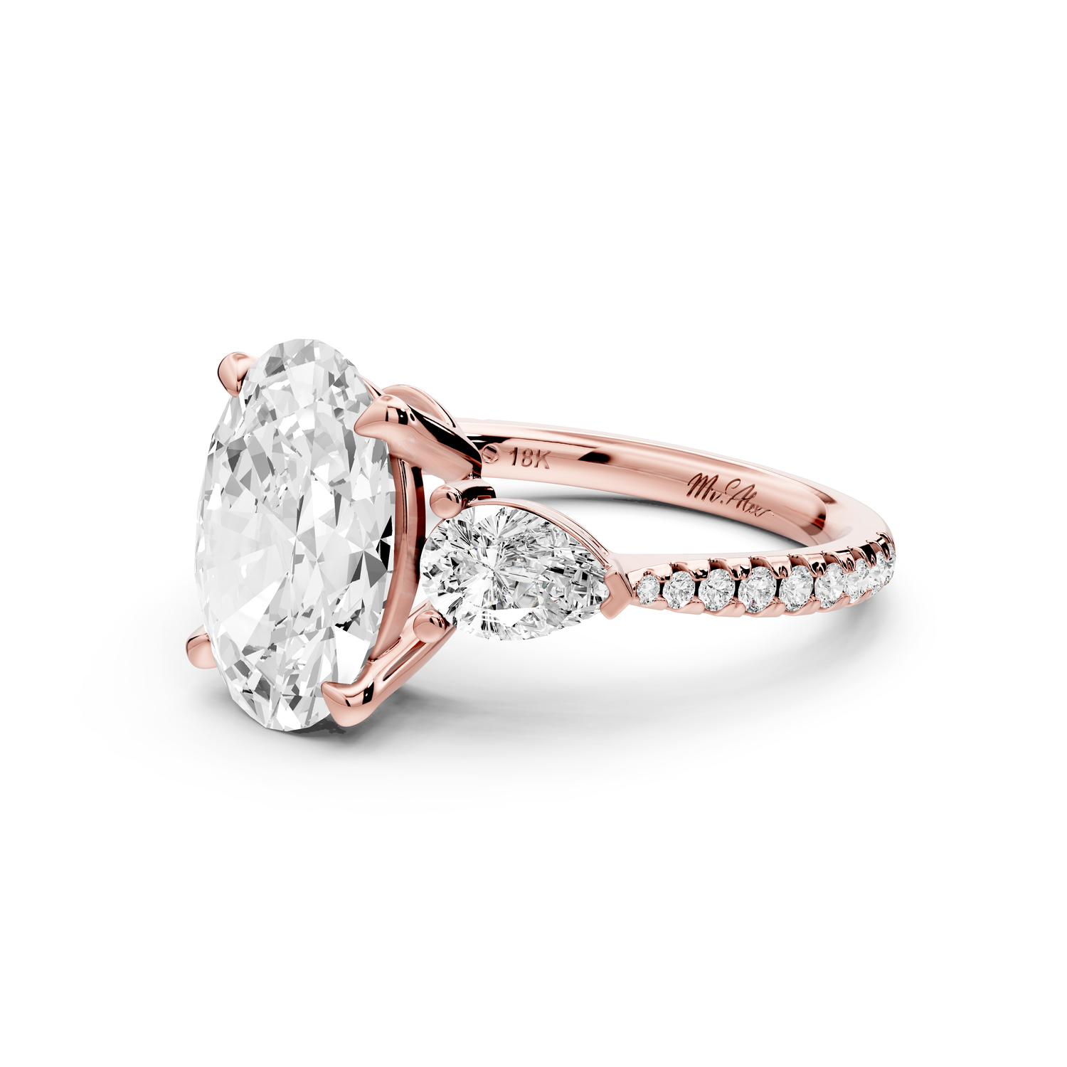 Alma - 3ct 14k rose gold oval center stone with two pear shaped diamonds and pavé. Three stone oval and pear Engagement ring with Pavé