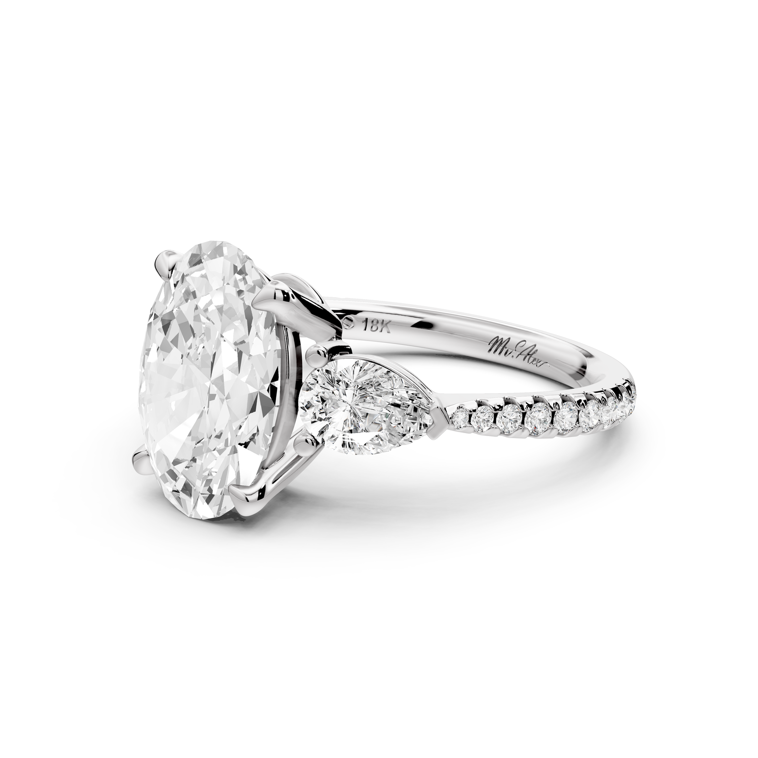 Alma - 3ct 14k white gold oval center stone with two pear shaped diamonds and pavé. Three stone oval and pear Engagement ring with Pavé