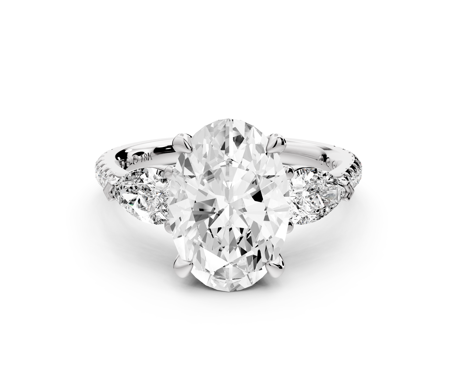 Alma - 3ct 14k white gold oval center stone with two pear shaped diamonds and pavé. Three stone oval and pear Engagement ring with Pavé