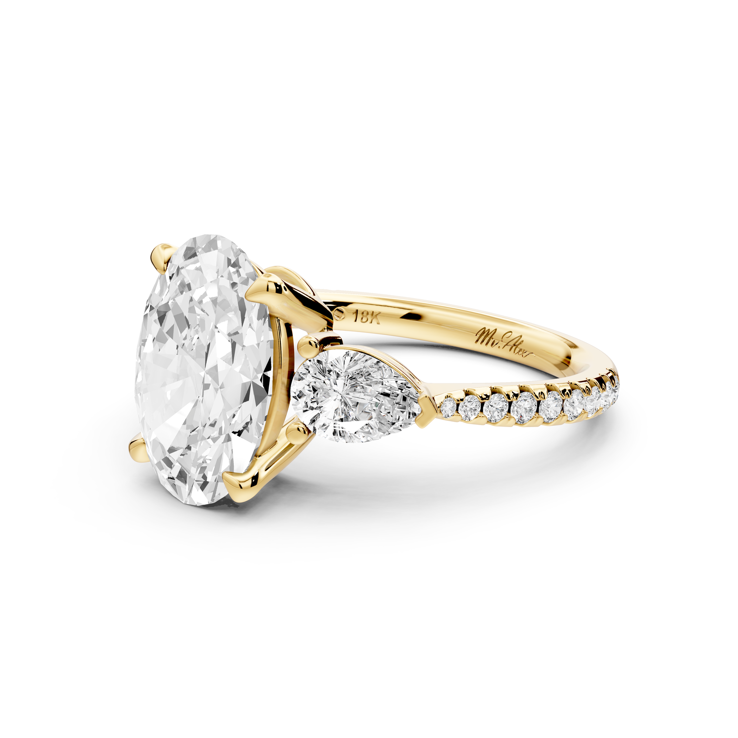 Alma - 3ct 14k yellow gold oval center stone with two pear shaped diamonds and pavé. Three stone oval and pear Engagement ring with Pavé