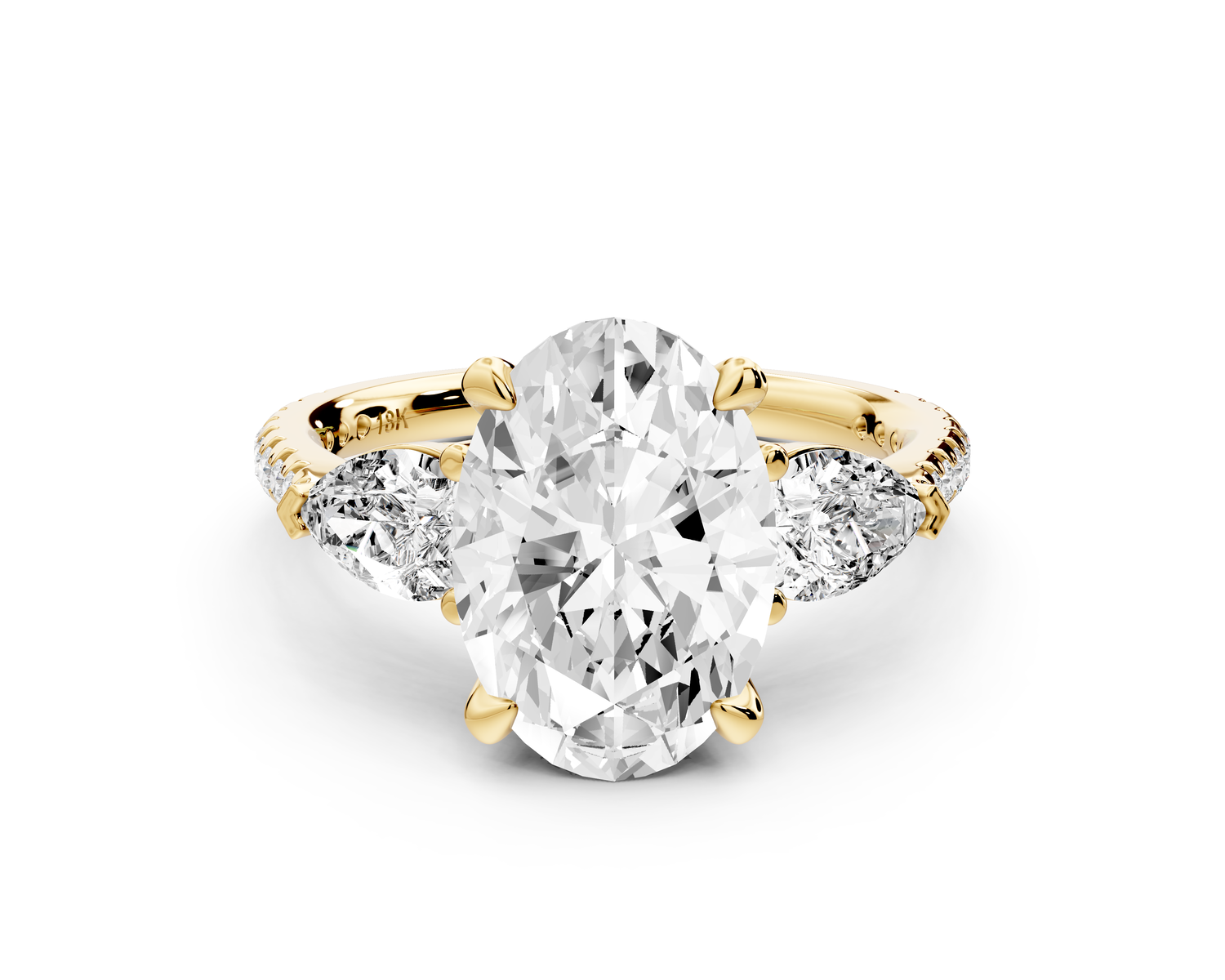Alma - 3ct 14k yellow gold oval center stone with two pear shaped diamonds and pavé. Three stone oval and pear Engagement ring with Pavé