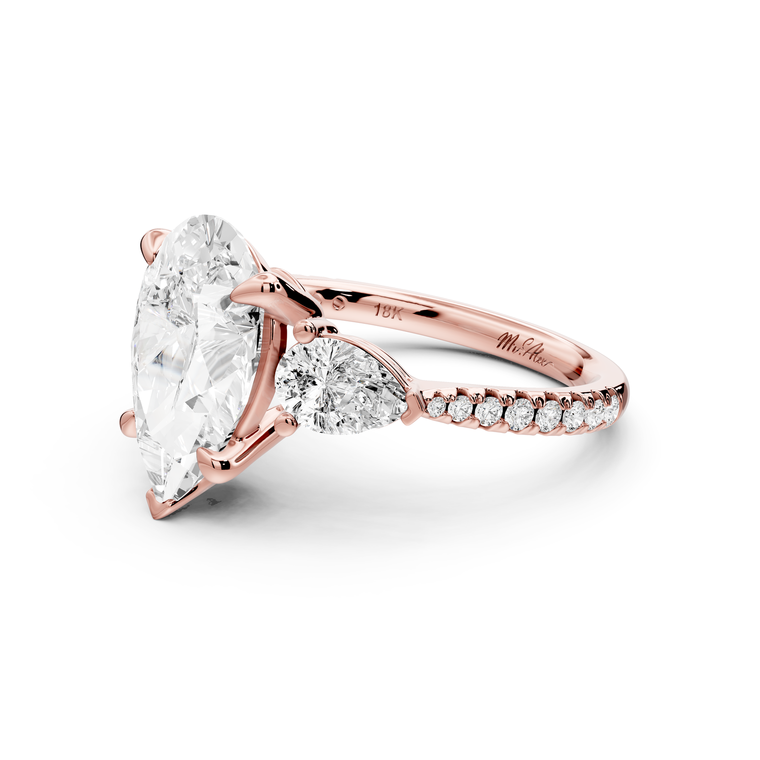 Alma - 3ct 14k rose gold pear center stone with two pear shaped diamonds and pavé. Three stone oval and pear Engagement ring with Pavé