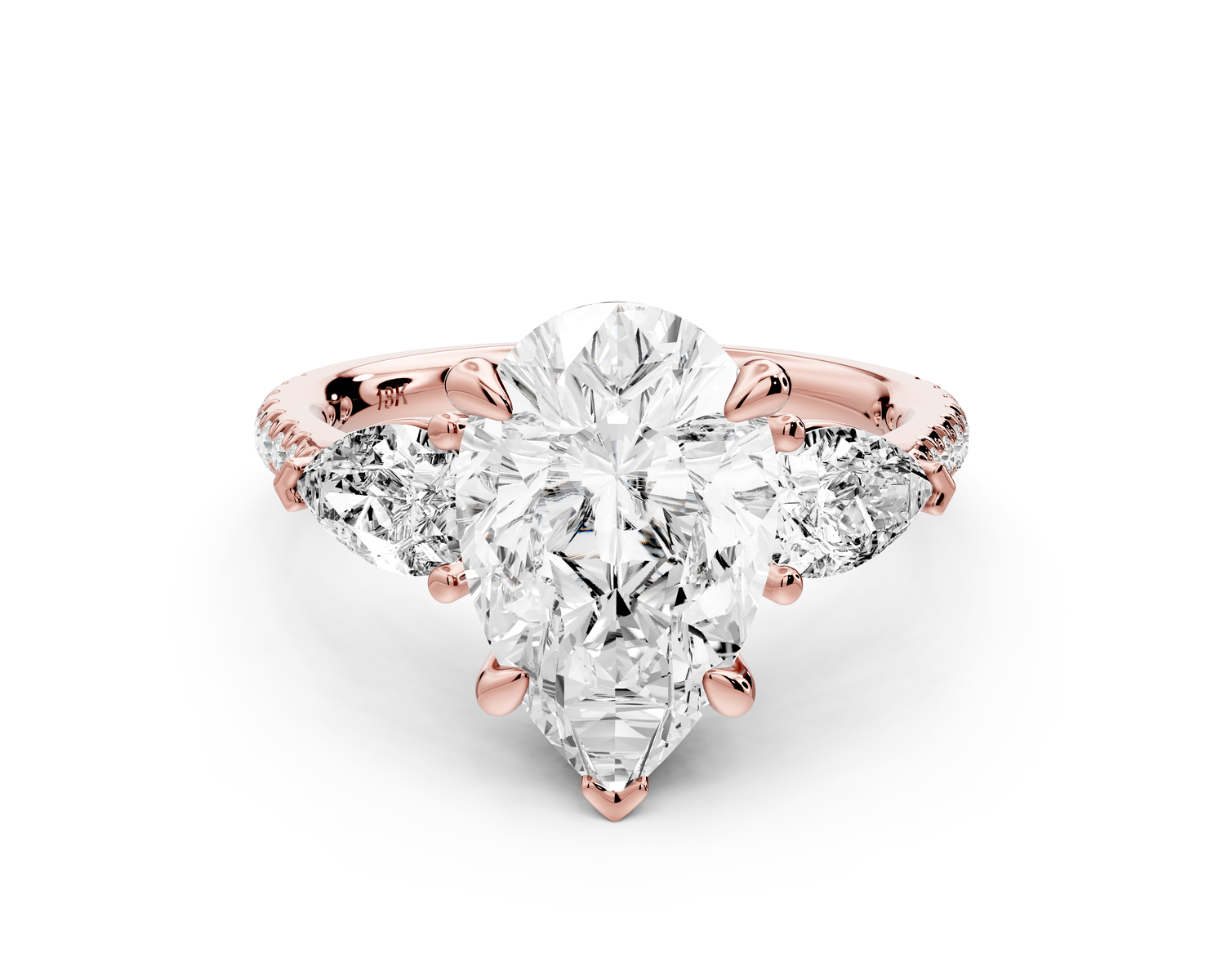 Alma - 3ct 14k rose gold pear center stone with two pear shaped diamonds and pavé. Three stone oval and pear Engagement ring with Pavé