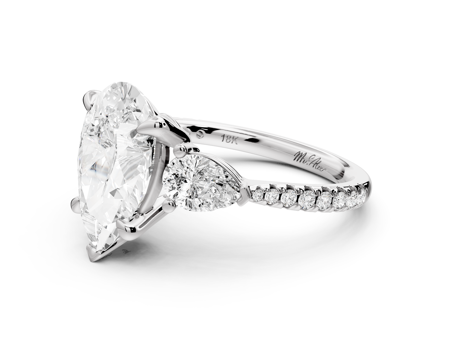 Alma - 3ct 14k white gold pear center stone with two pear shaped diamonds and pavé. Three stone oval and pear Engagement ring with Pavé