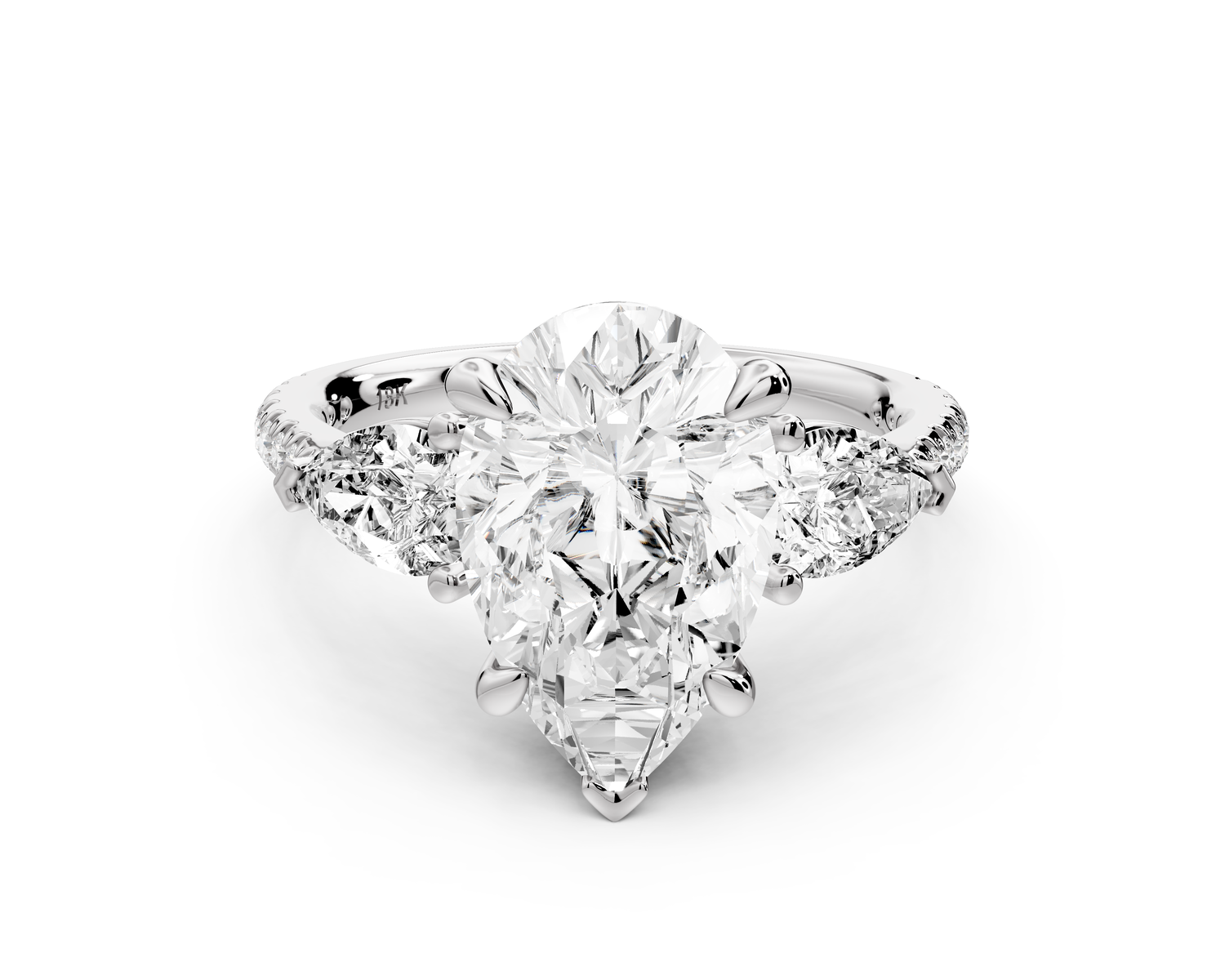 Alma - 3ct 14k white gold pear center stone with two pear shaped diamonds and pavé. Three stone oval and pear Engagement ring with Pavé