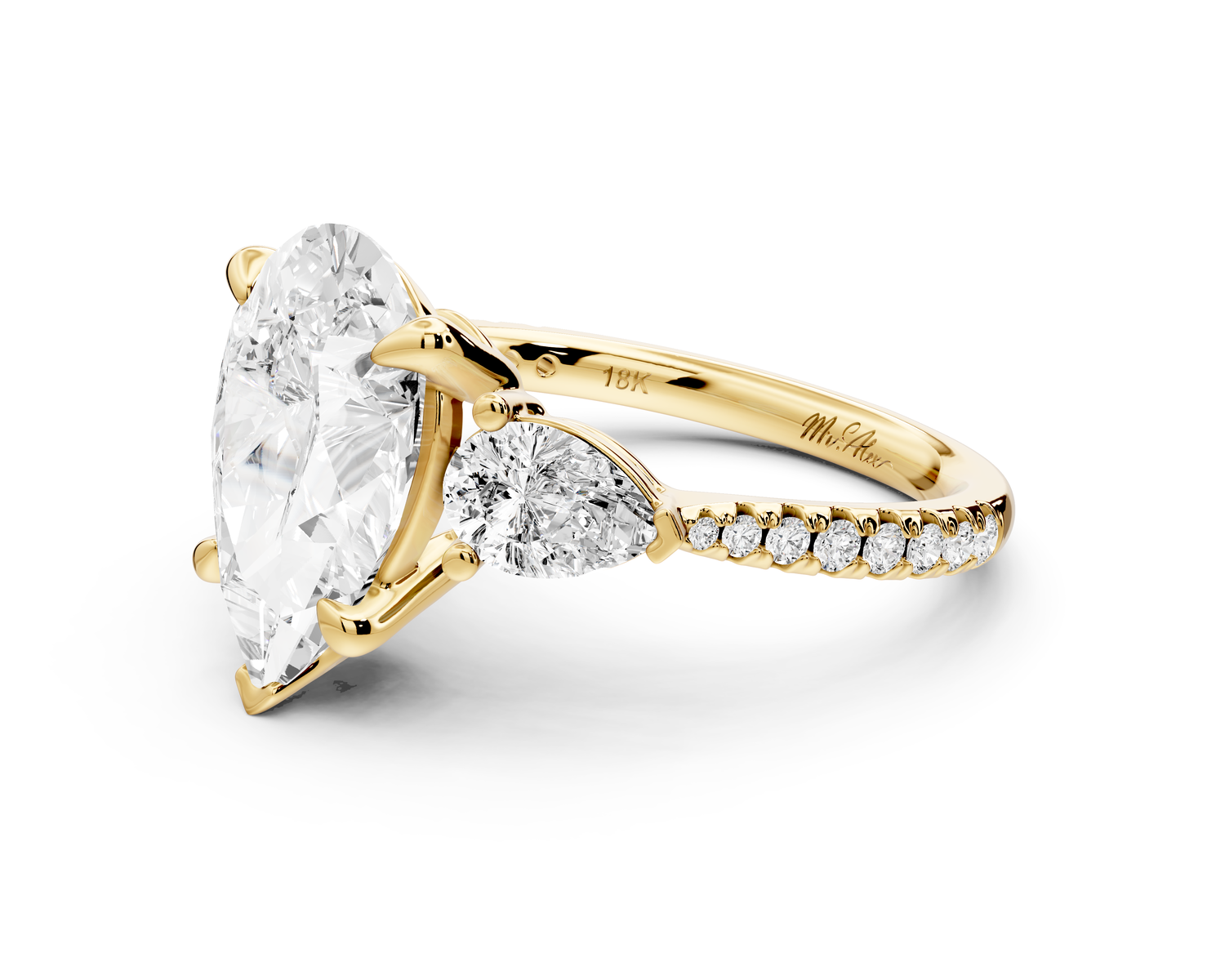 Alma - 3ct 14k yellow gold pear center stone with two pear shaped diamonds and pavé. Three stone oval and pear Engagement ring with Pavé