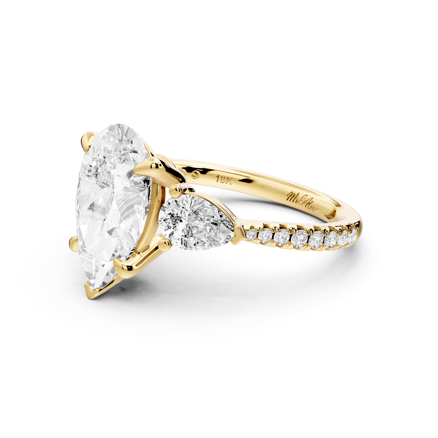 Alma - 3ct 14k yellow gold pear center stone with two pear shaped diamonds and pavé. Three stone oval and pear Engagement ring with Pavé
