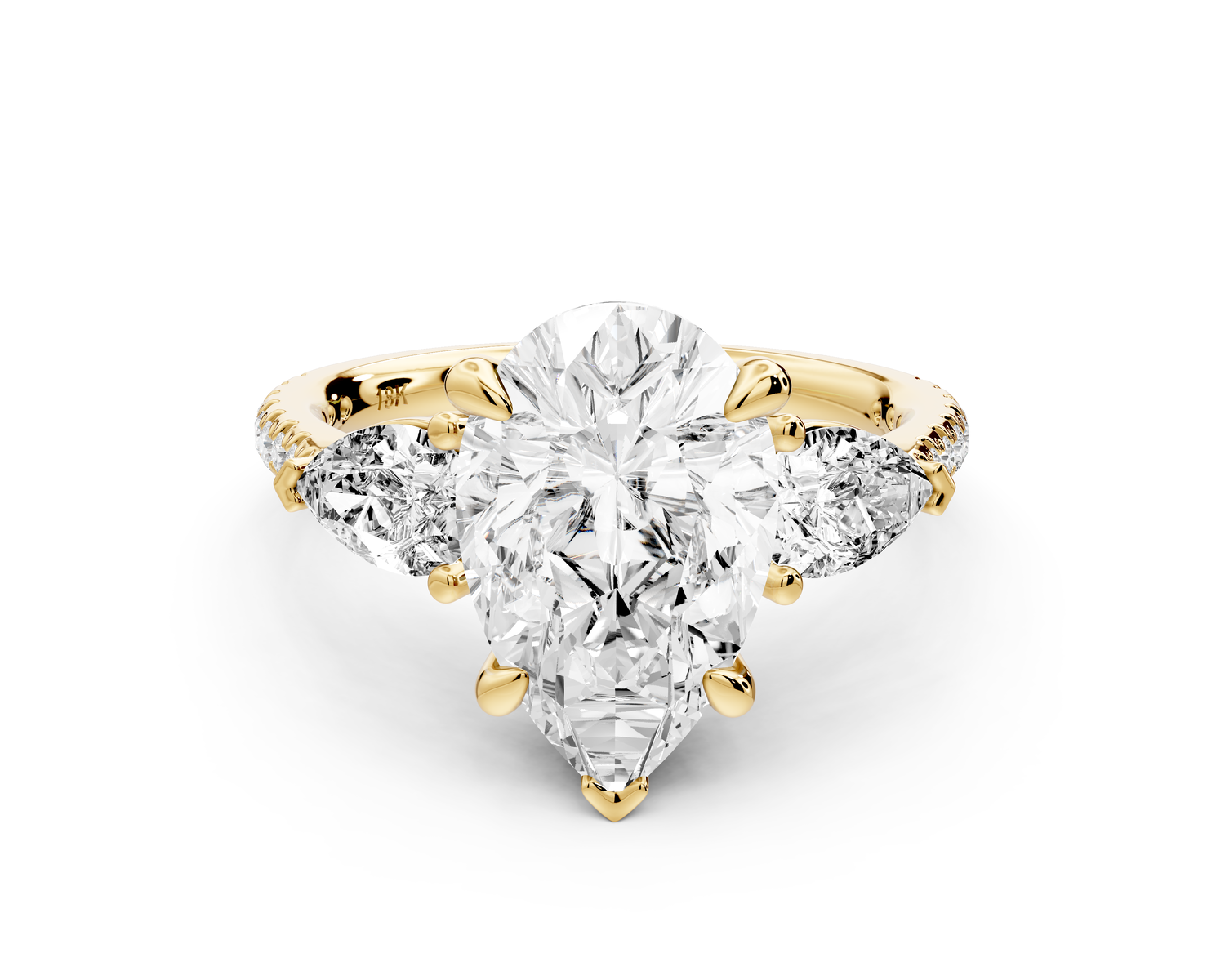 Alma - 3ct 14k yellow gold pear center stone with two pear shaped diamonds and pavé. Three stone oval and pear Engagement ring with Pavé