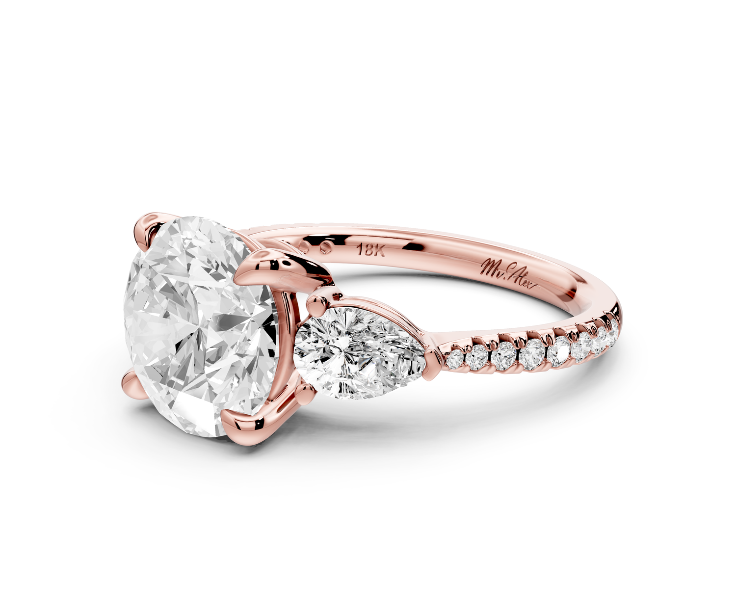 Alma - 3ct 18k rose gold round center stone with two pear shaped diamonds and pavé. Three stone oval and pear engagment ring with Pavé