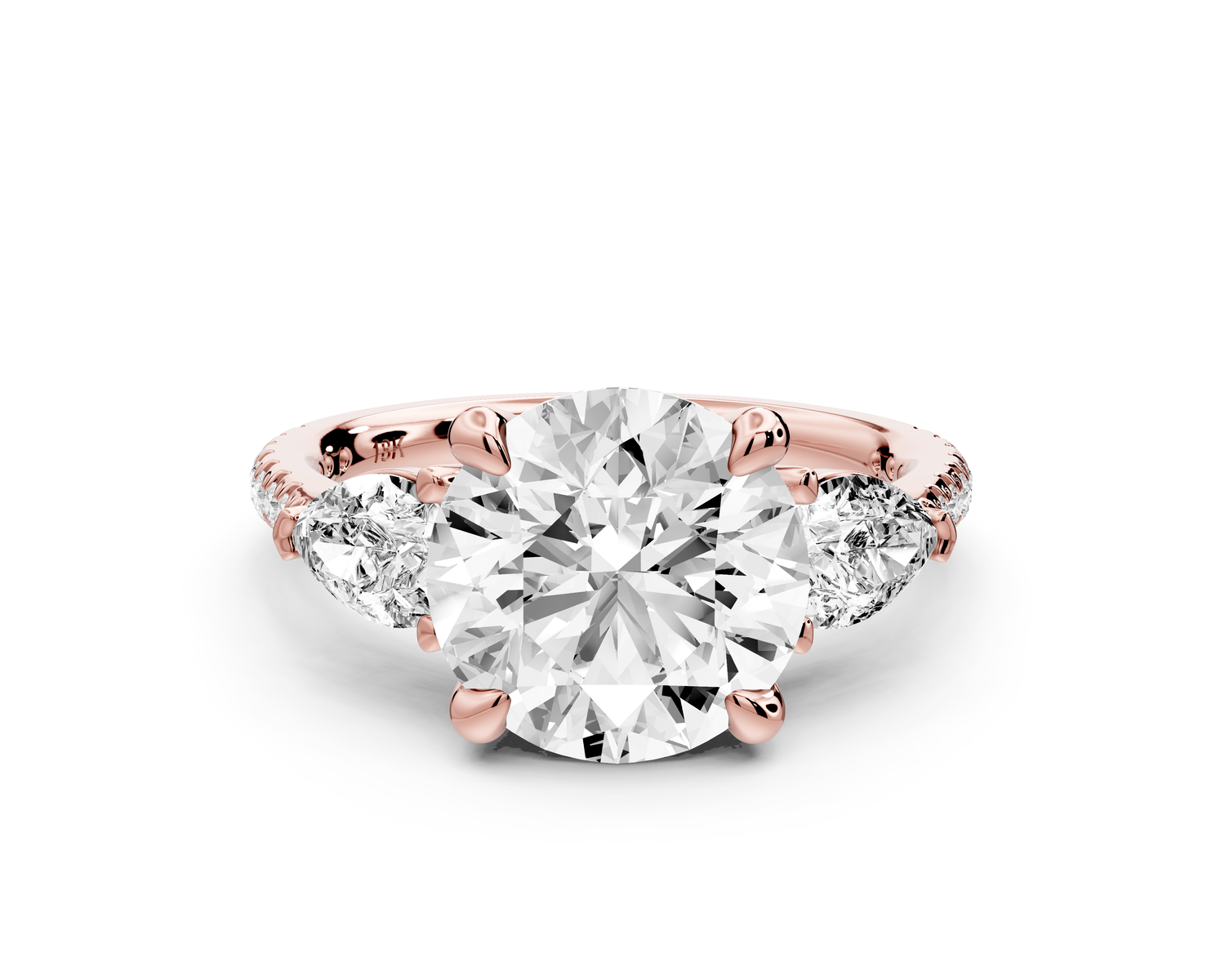 Alma - 3ct 14k rose gold round center stone with two pear shaped diamonds and pavé. Three stone oval and pear engagment ring with Pavé