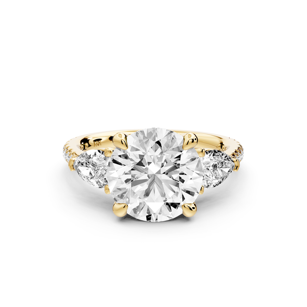 Alma - 3ct 14k yellow gold round center stone with two pear shaped diamonds and Pavé. Three stone oval and pear engagment ring with Pavé