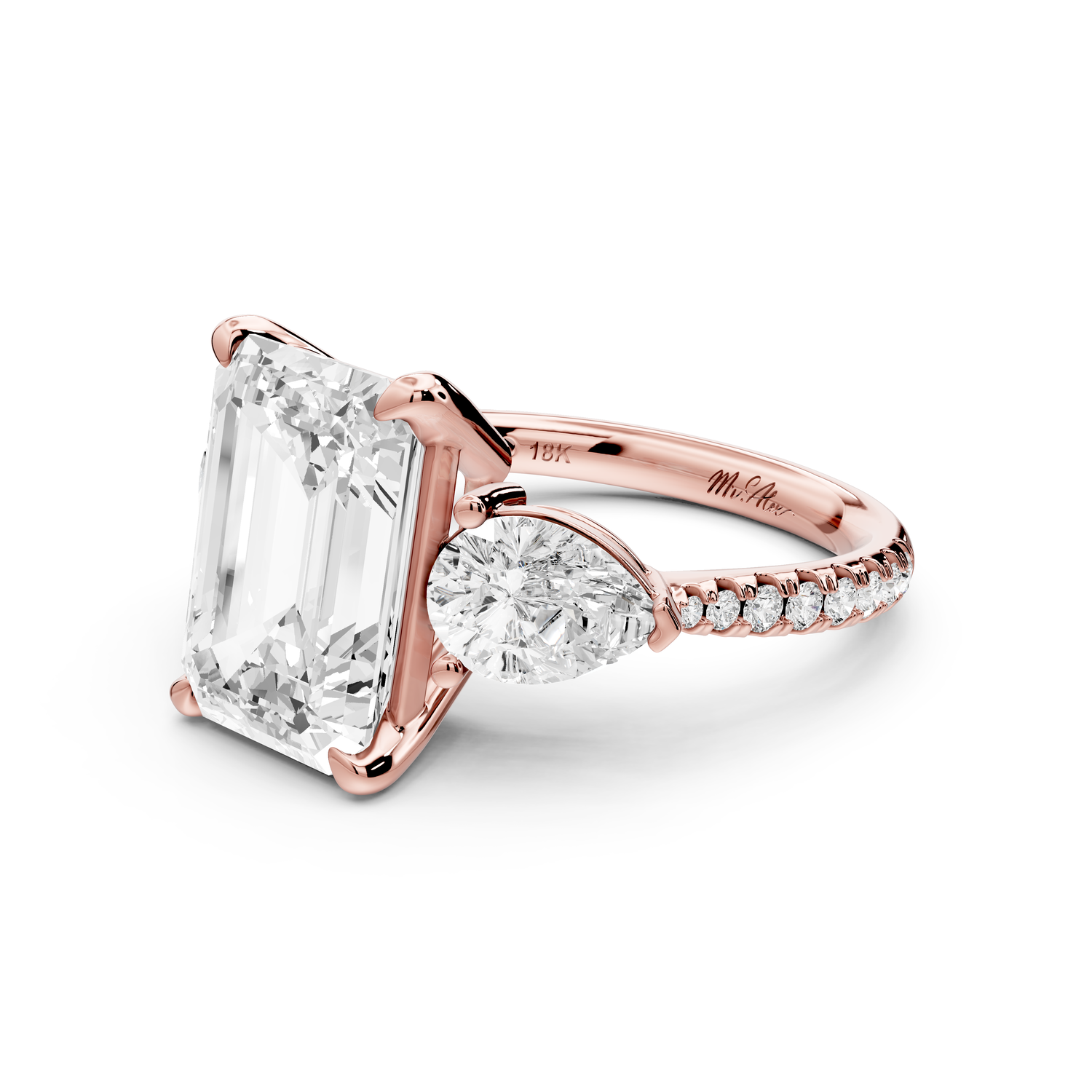 Alma - 4ct 14k rose gold emerald center stone with two pear shaped diamonds and pavé. Three stone oval and pear Engagement ring with Pavé