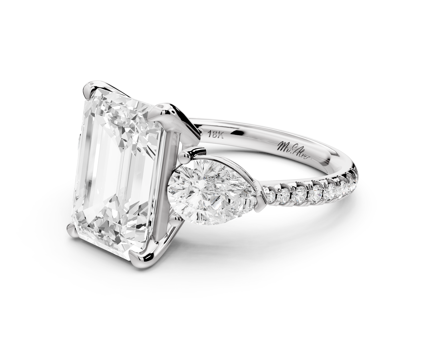 Alma - 4ct 14k white gold emerald center stone with two pear shaped diamonds and pavé. Three stone oval and pear Engagement ring with Pavé