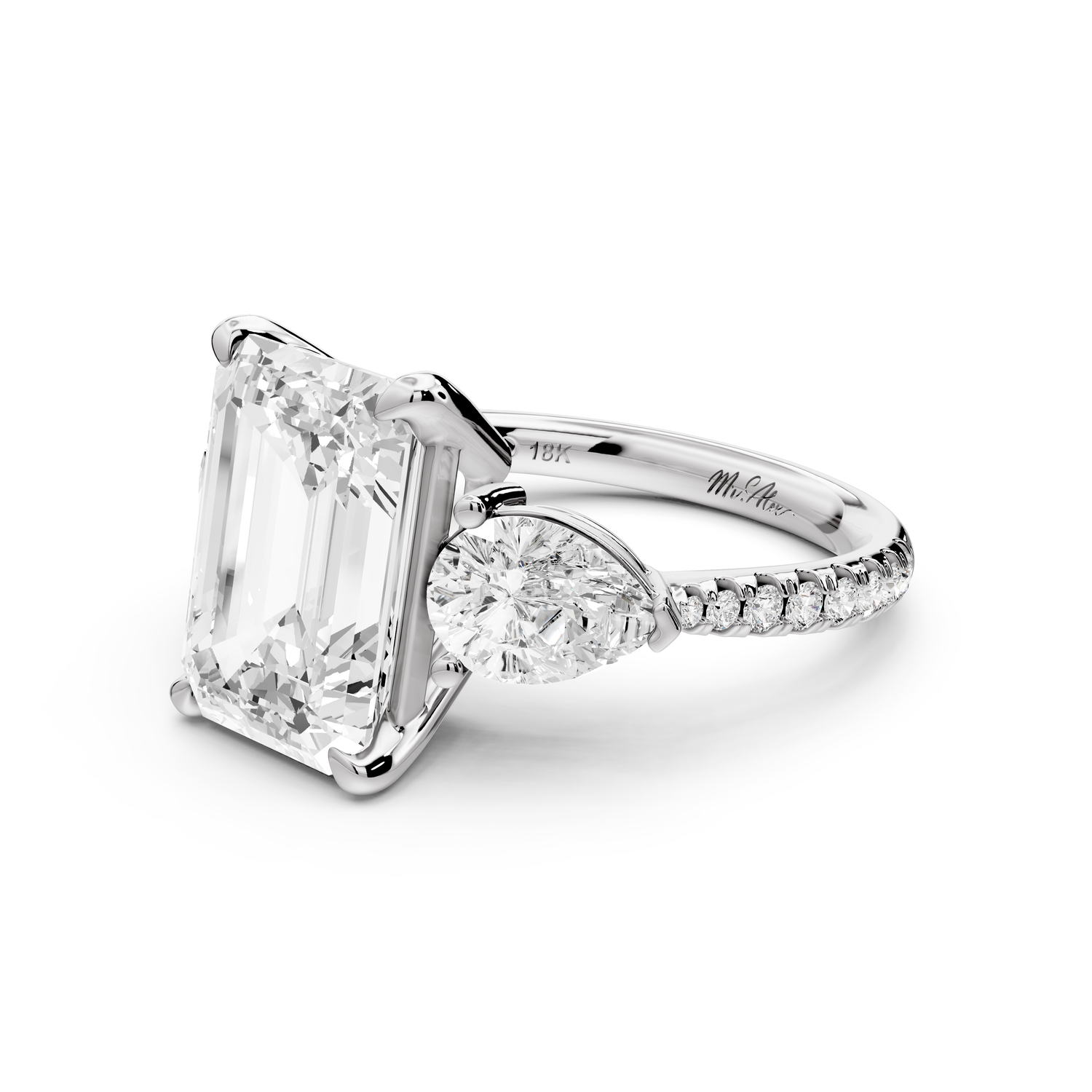 Alma - 4ct 14k white gold emerald center stone with two pear shaped diamonds and pavé. Three stone oval and pear Engagement ring with Pavé