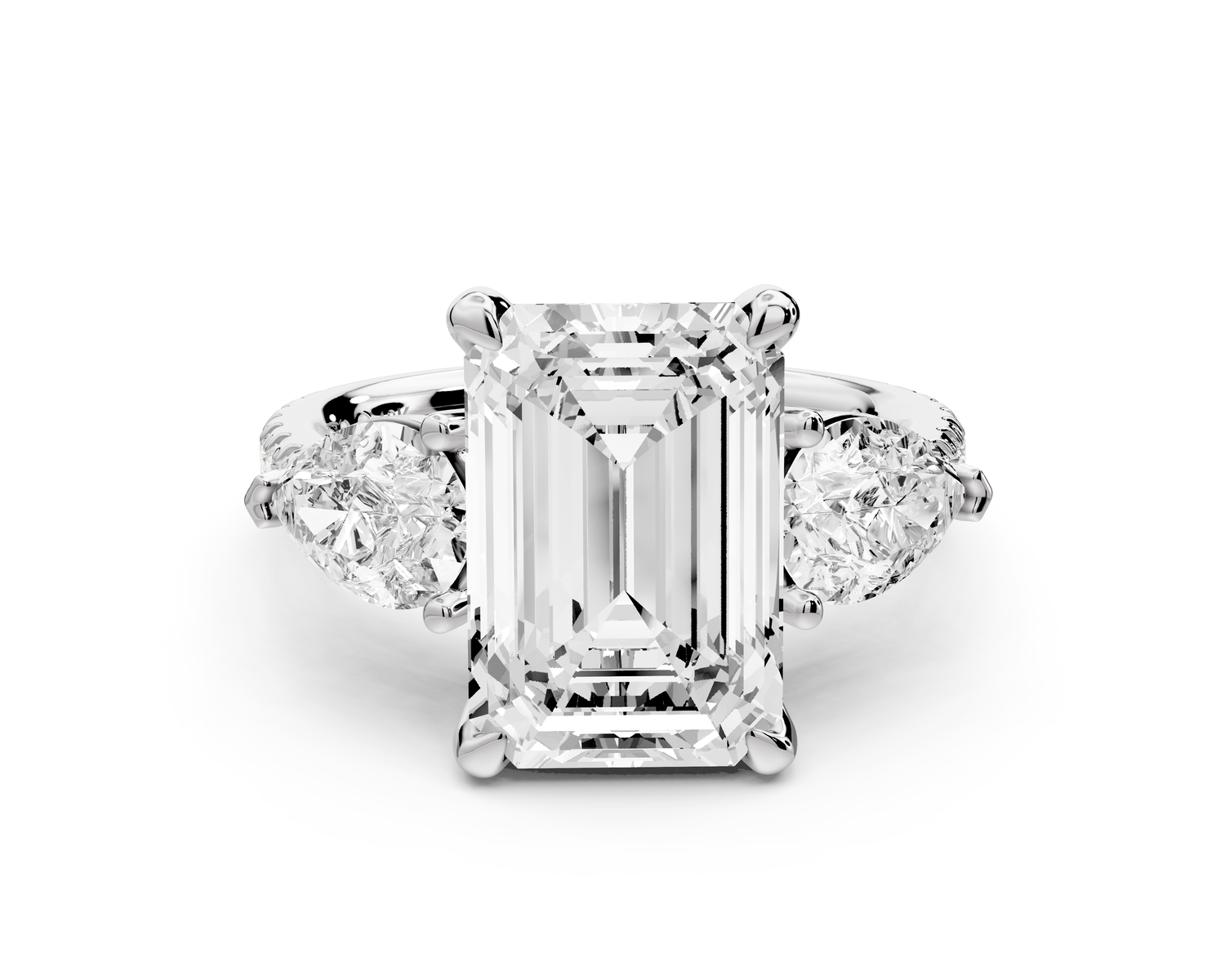 Alma - 4ct 14k white gold emerald center stone with two pear shaped diamonds and pavé. Three stone oval and pear Engagement ring with Pavé