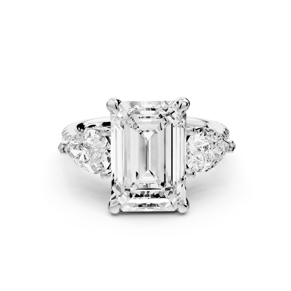 Alma - 4ct 14k white gold emerald center stone with two pear shaped diamonds and pavé. Three stone oval and pear Engagement ring with Pavé