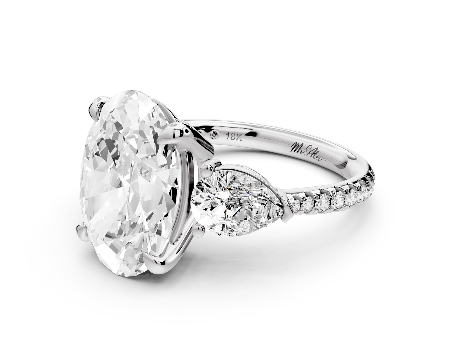 Alma - 4ct 14k white gold oval center stone with two pear shaped diamonds and pavé. Three stone oval and pear Engagement ring with Pavé