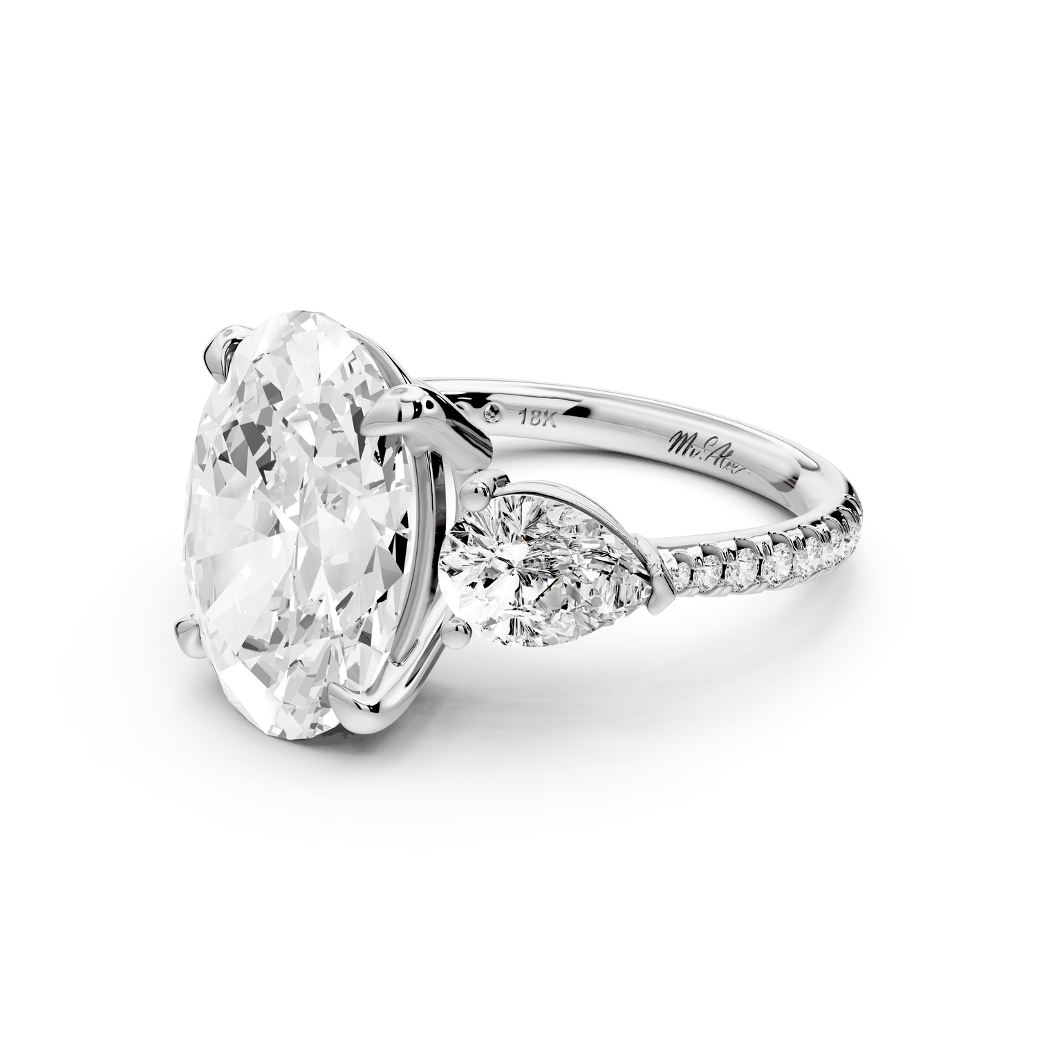 Alma - 4ct 14k white gold oval center stone with two pear shaped diamonds and pavé. Three stone oval and pear Engagement ring with Pavé