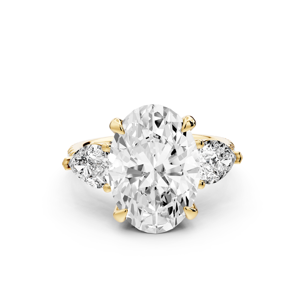 Alma - 4ct 14k yellow gold oval center stone with two pear shaped diamonds and pavé. Three stone oval and pear Engagement ring with Pavé