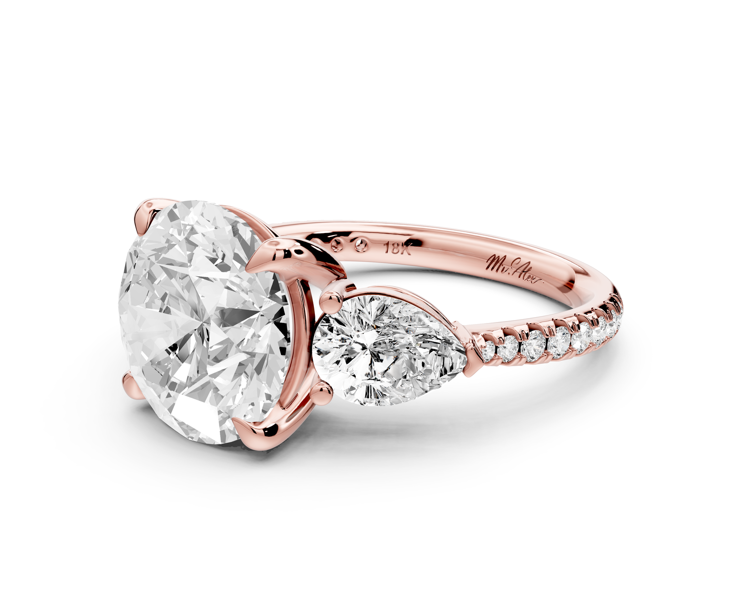 Alma - 4ct 14k rose gold round center stone with two pear shaped diamonds and pavé. Three stone oval and pear engagment ring with Pavé
